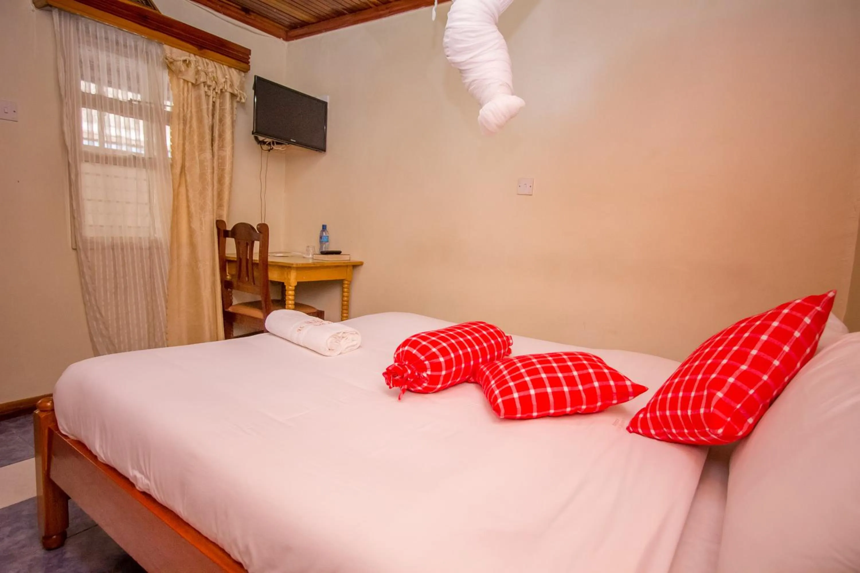 Bedroom in Sunshine Hotel Tengecha