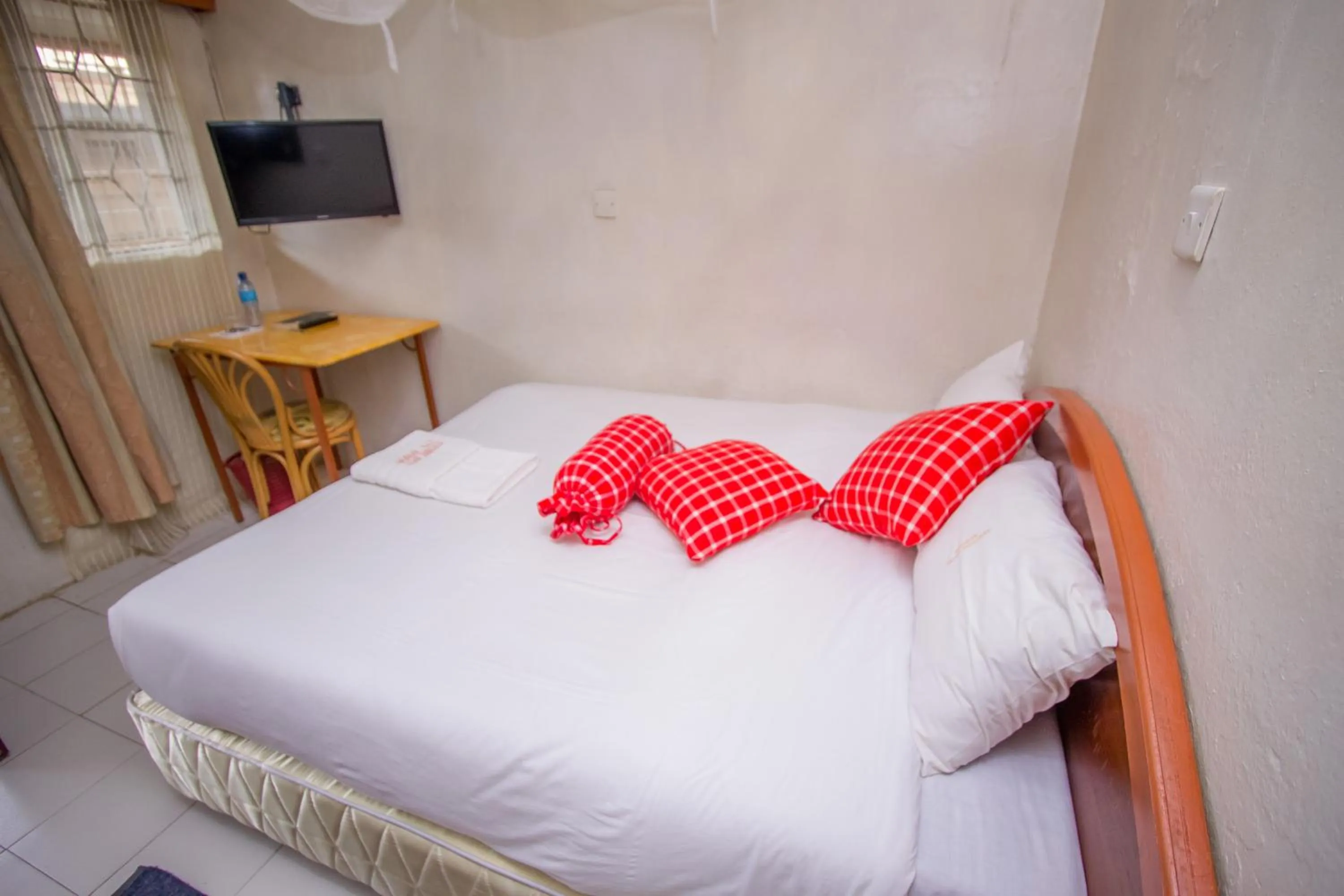 Bedroom in Sunshine Hotel Tengecha