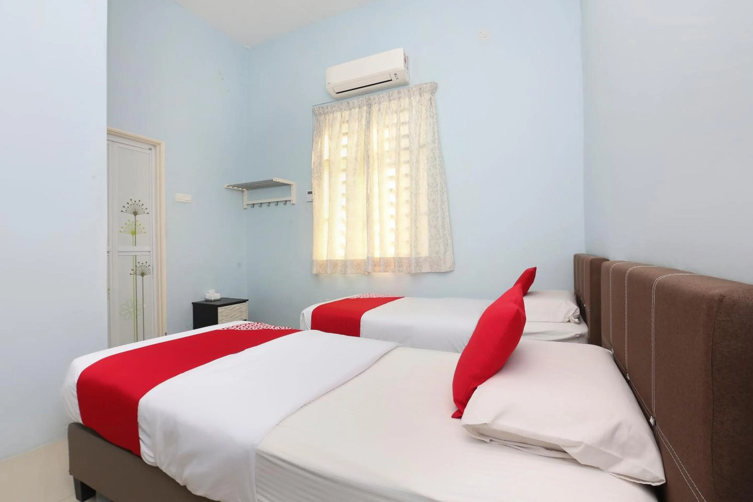 Bedroom, Bed in Hotel O Come Inn Premium