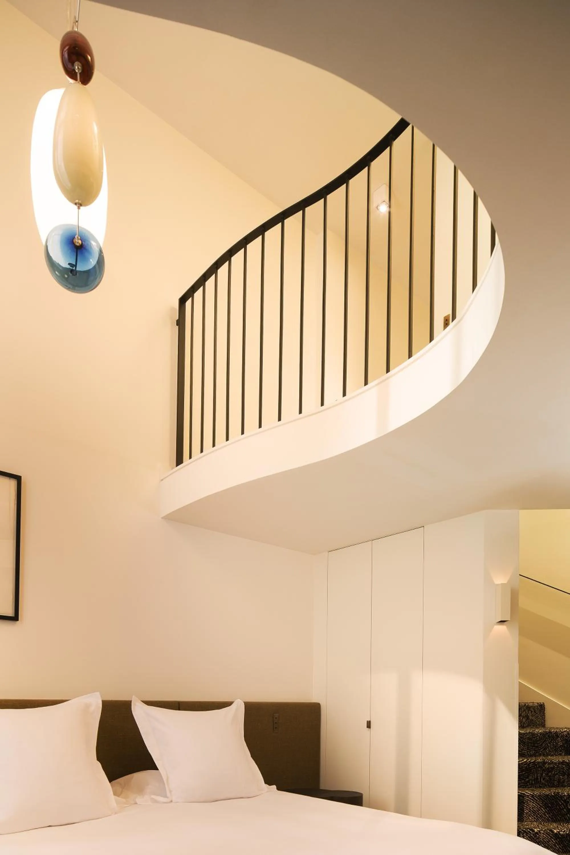 Bed in Hotel Marignan Champs-Elysées