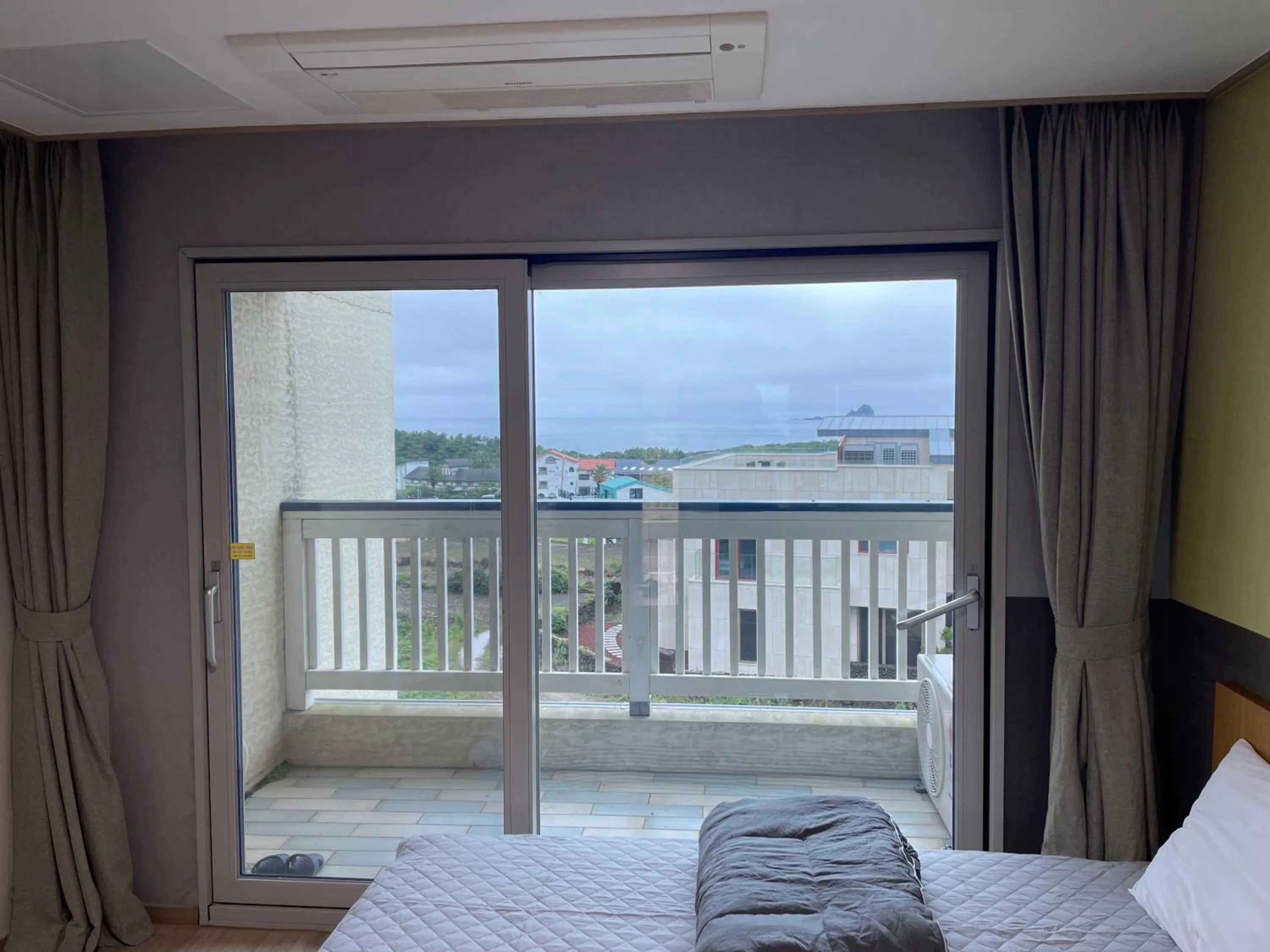 Bed in Jeju the Ocean Hill Pension