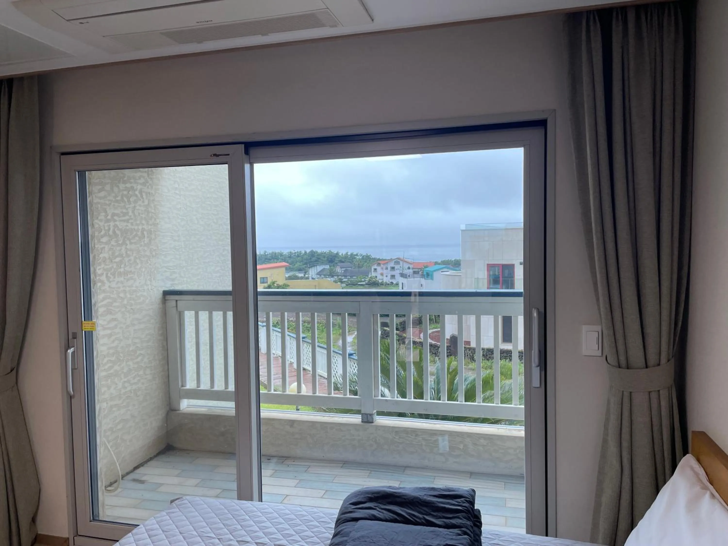 Bed in Jeju the Ocean Hill Pension