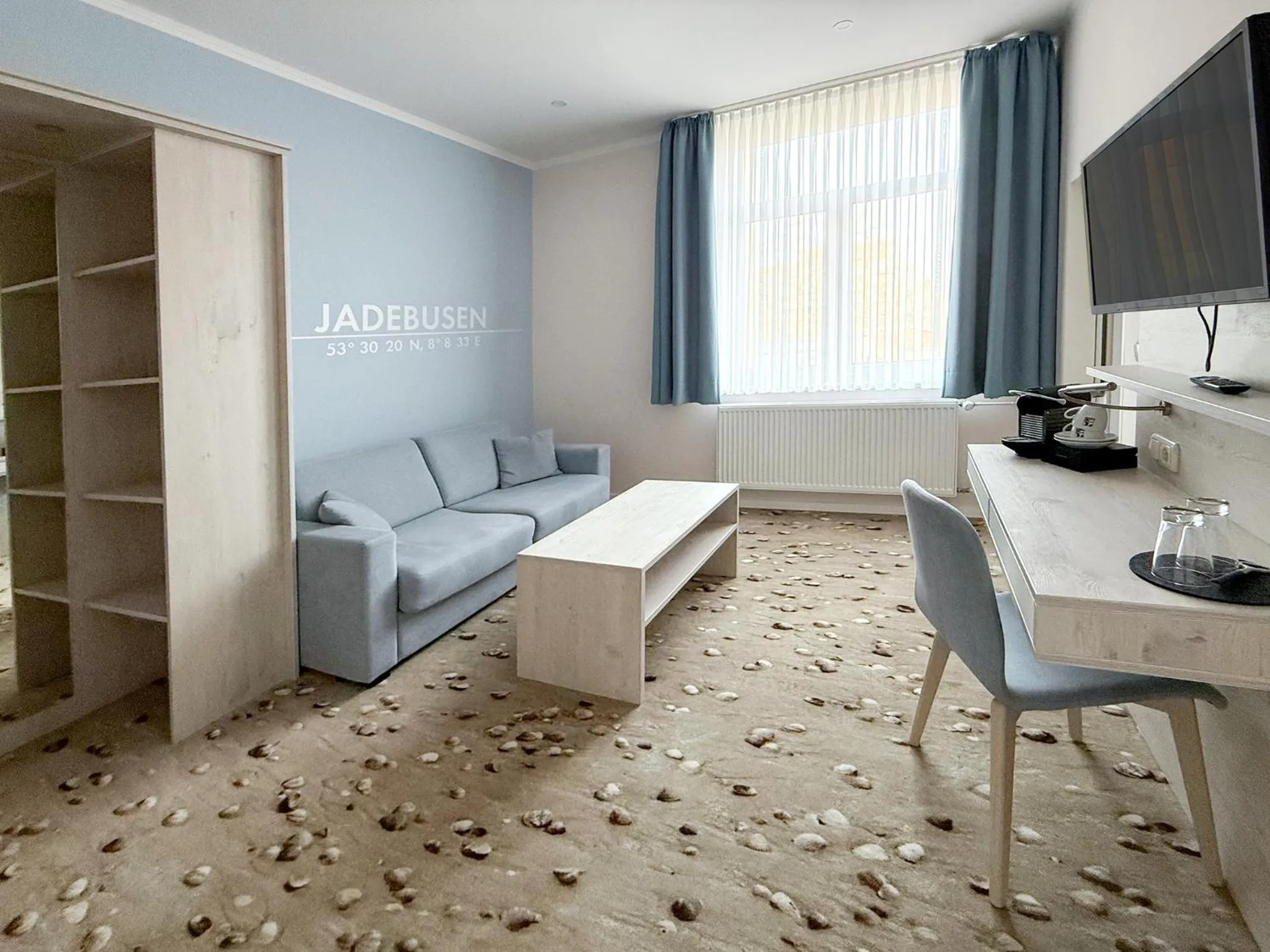 Living room in DORMERO Hotel Wilhelmshaven