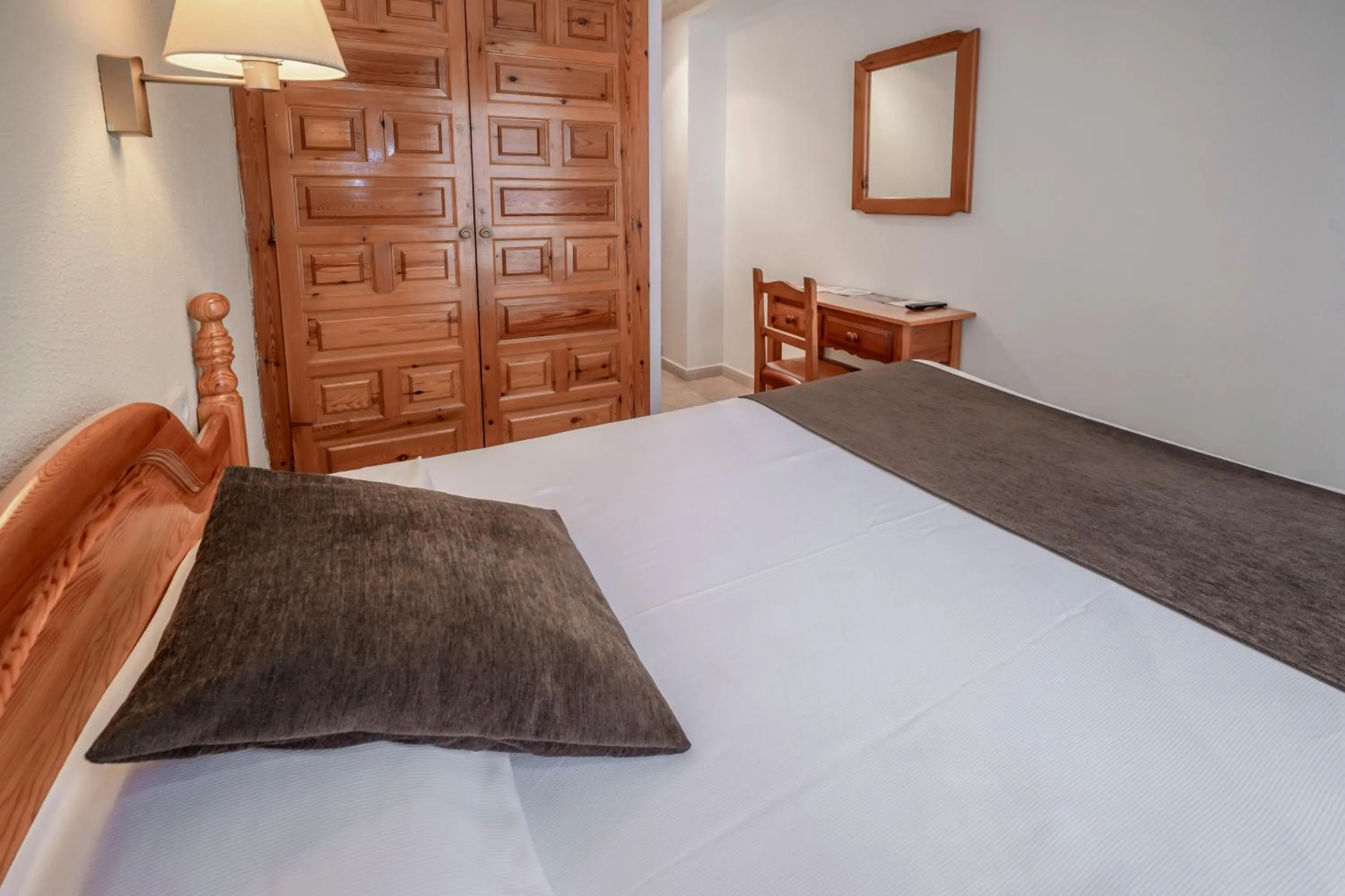 Photo of the whole room, Bed in Hotel GHT Neptuno-Tossa & Venus SPA