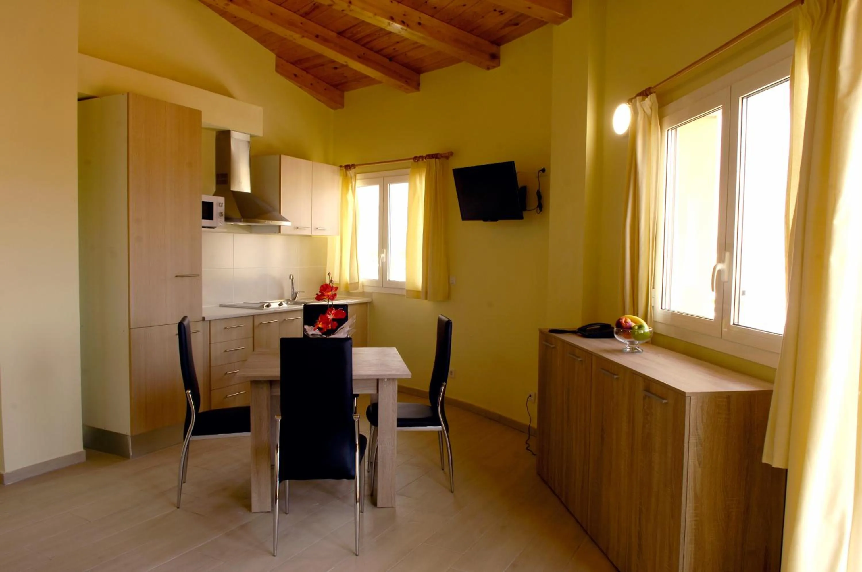 Kitchen or kitchenette in Apartamentos Giuliano