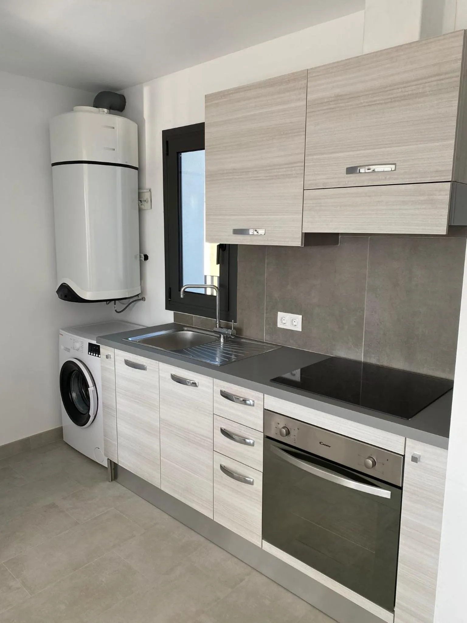 Kitchen or kitchenette in Apartamentos Giuliano