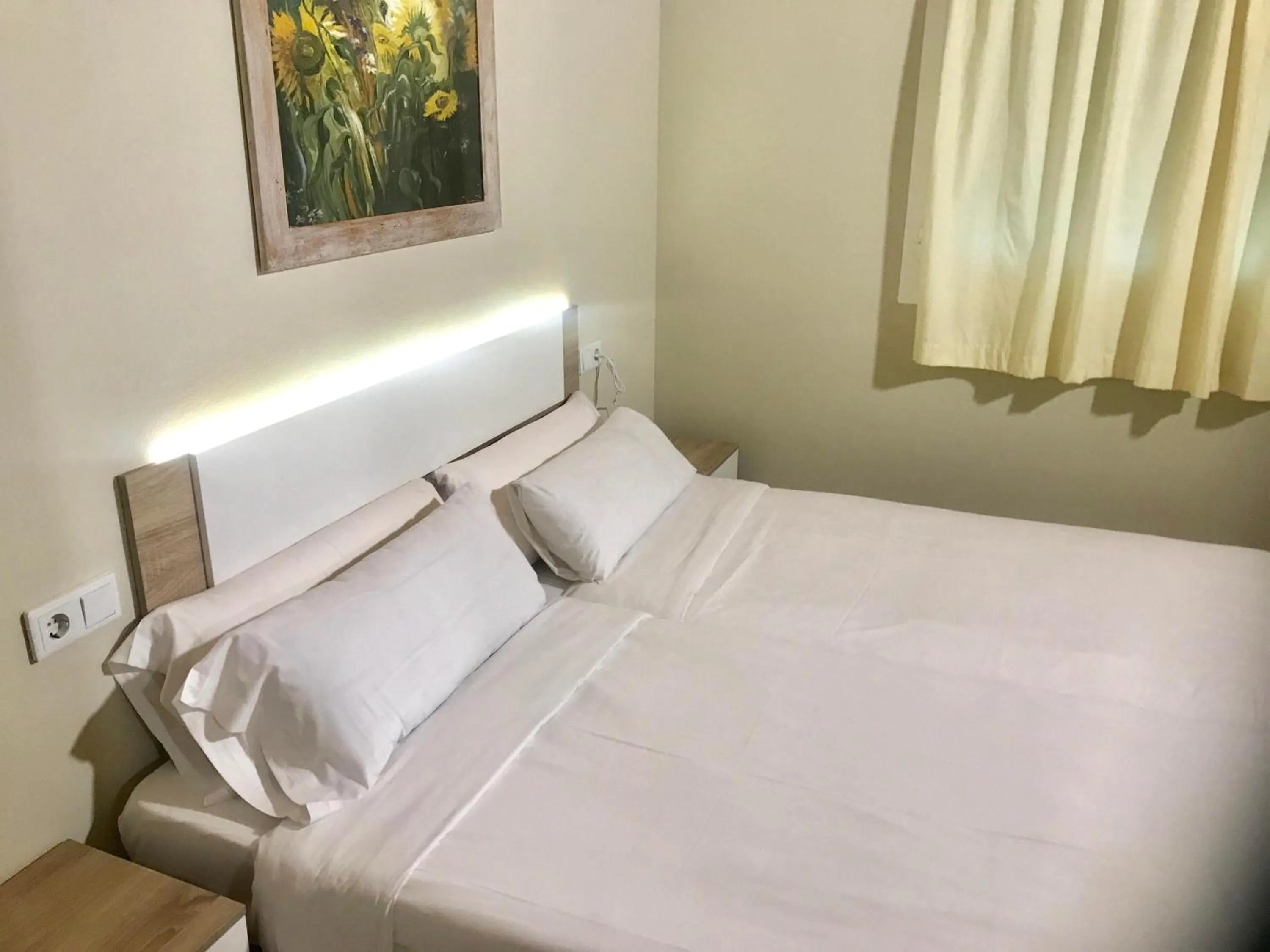 Bed in Apartamentos Giuliano