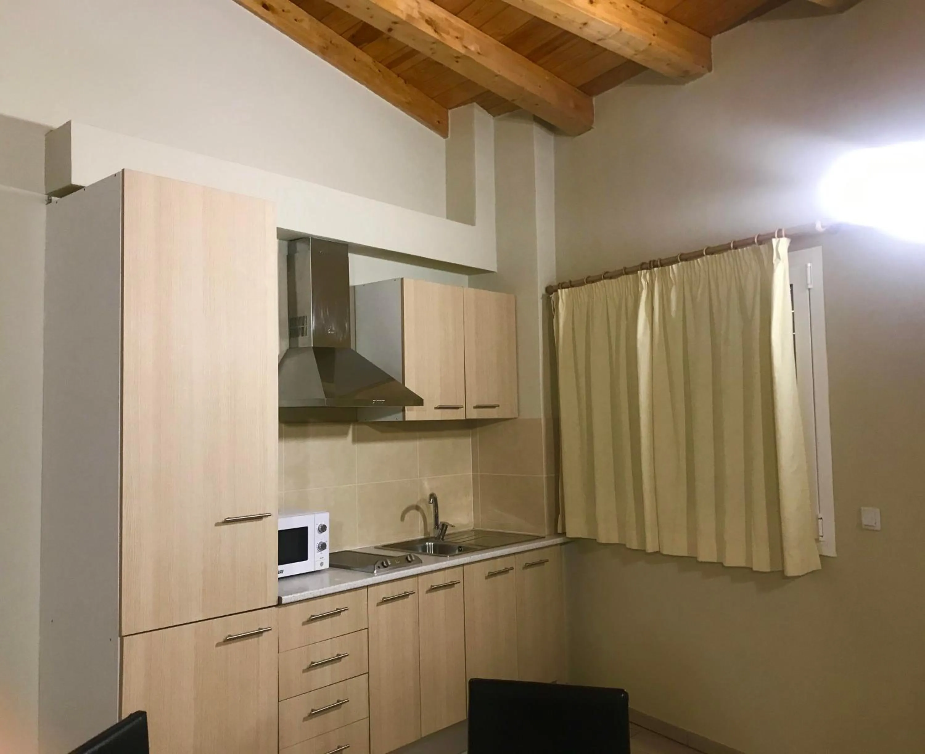 Kitchen or kitchenette in Apartamentos Giuliano