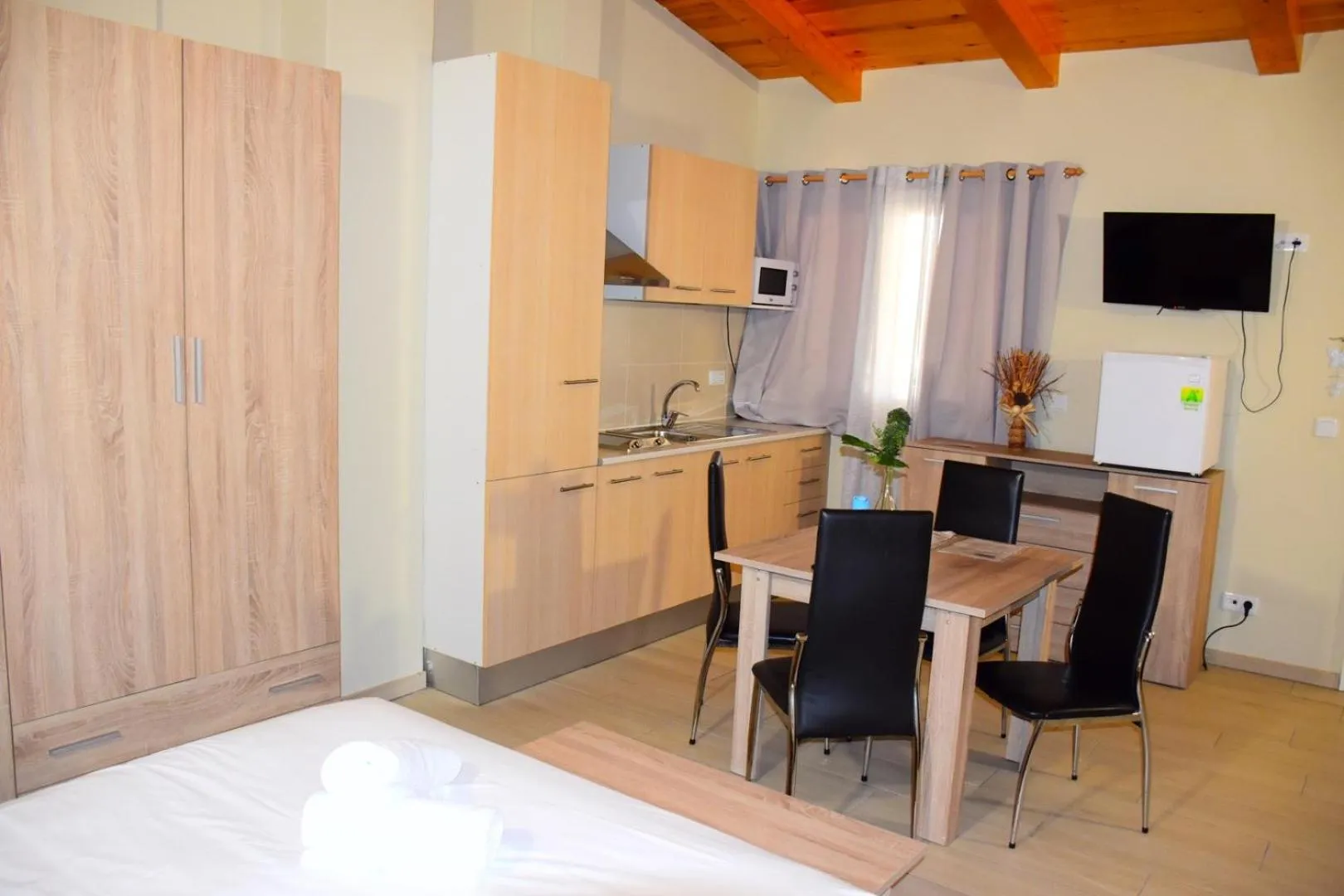 Kitchen or kitchenette in Apartamentos Giuliano