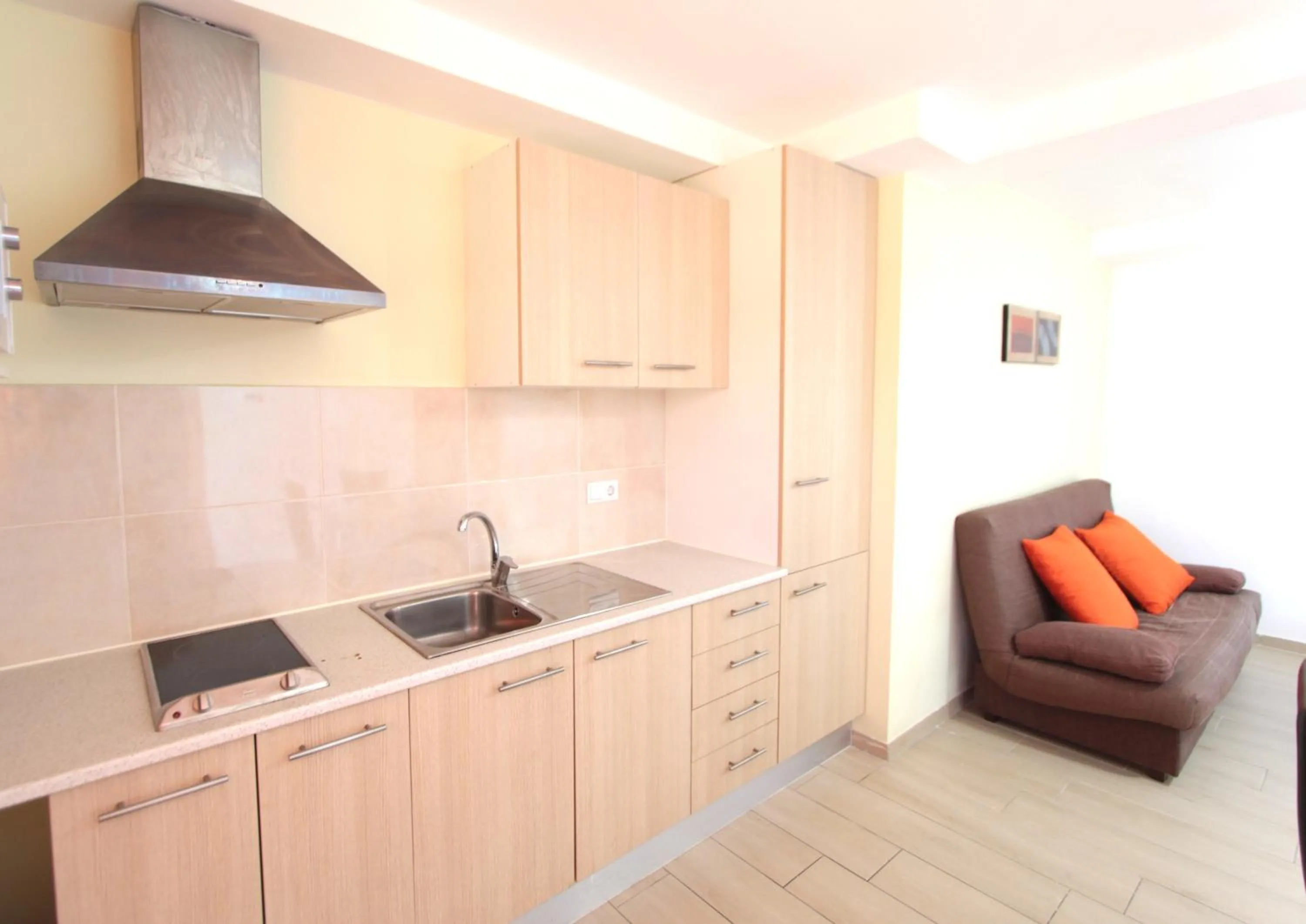 Kitchen or kitchenette in Apartamentos Giuliano