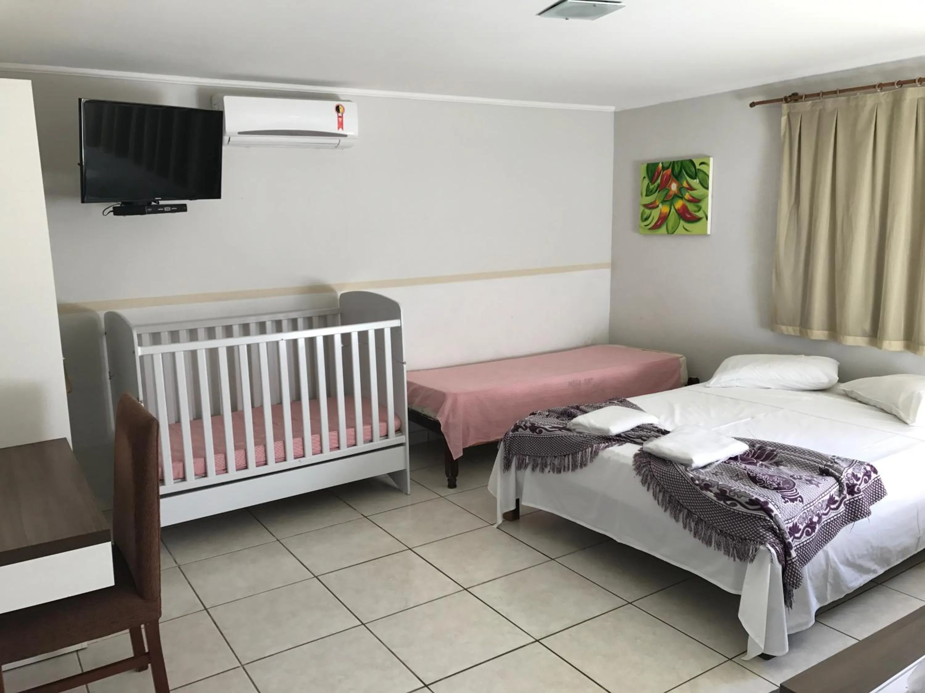cot, Bed in Hotel Pousada Mato Grosso