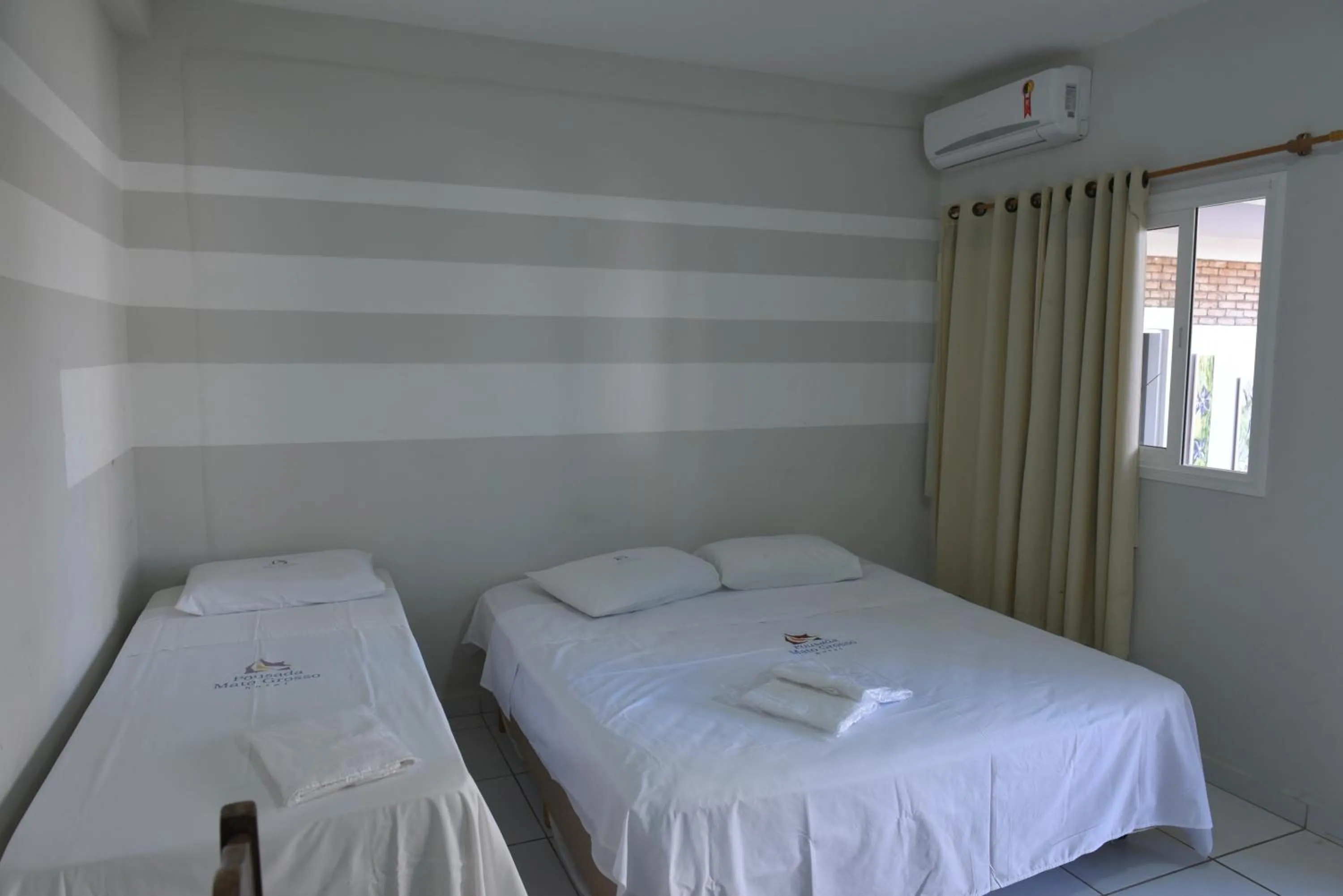 Bed in Hotel Pousada Mato Grosso