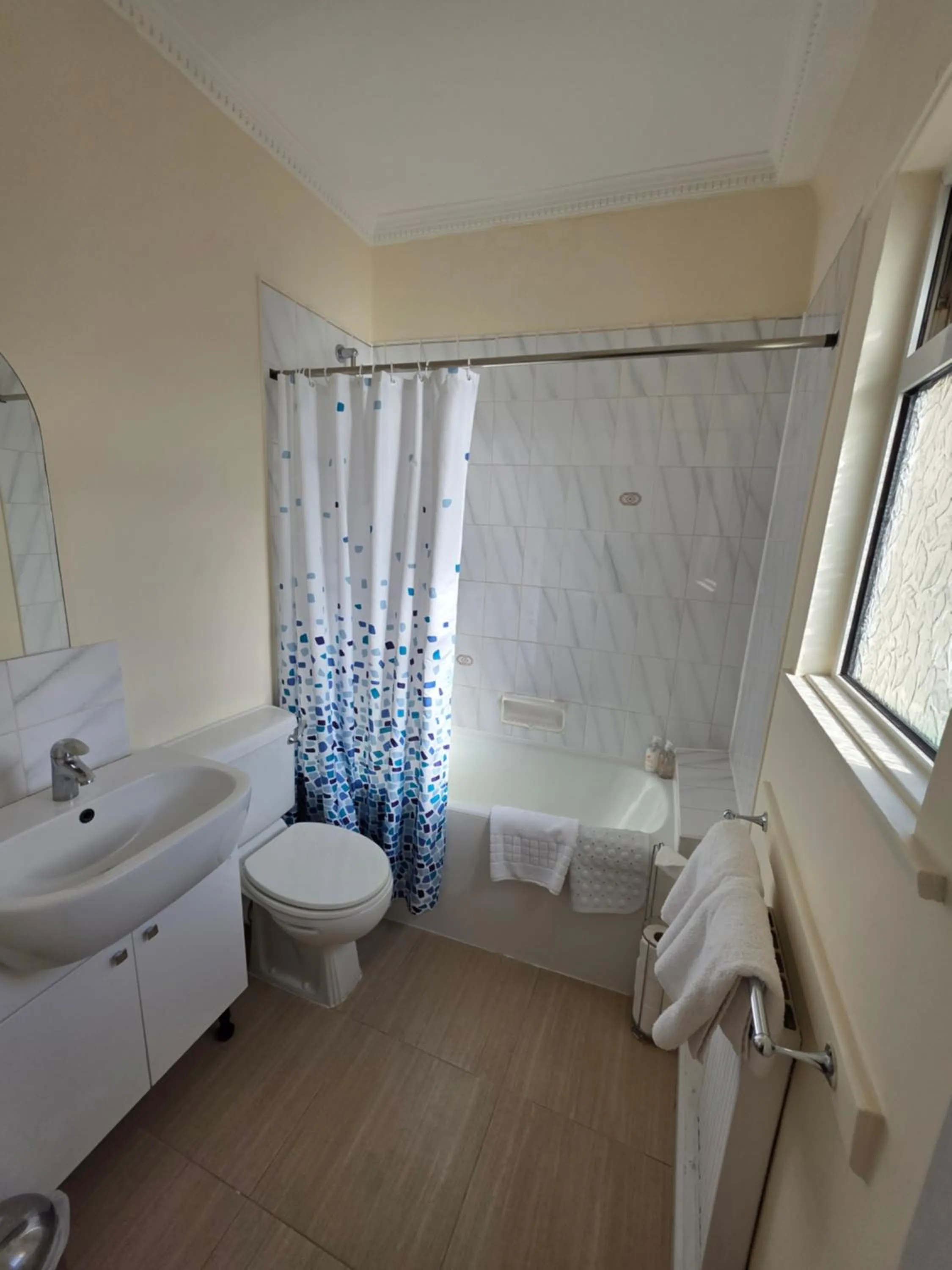 Bathroom in Marina Metro Hotel