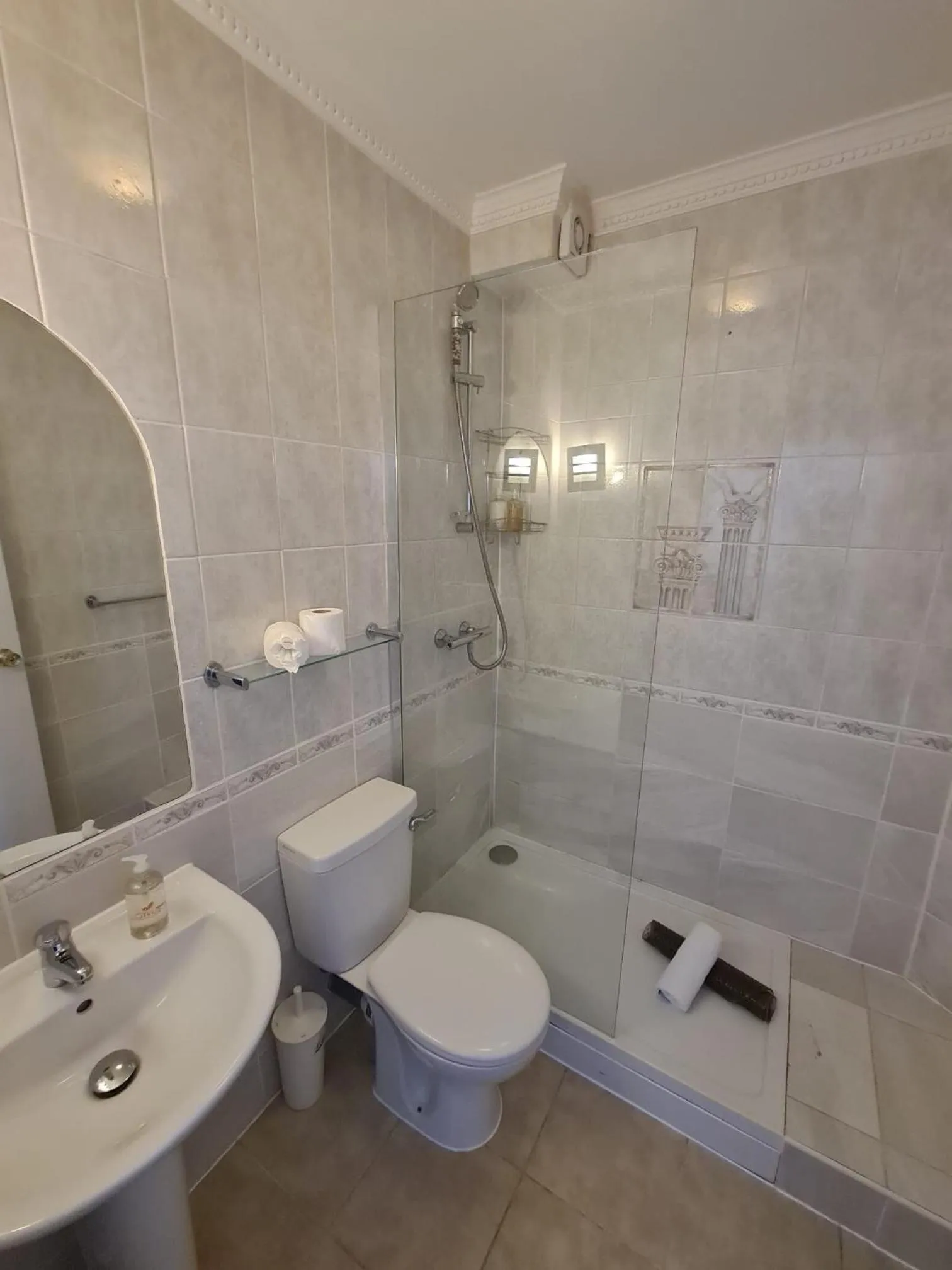 Bathroom in Marina Metro Hotel