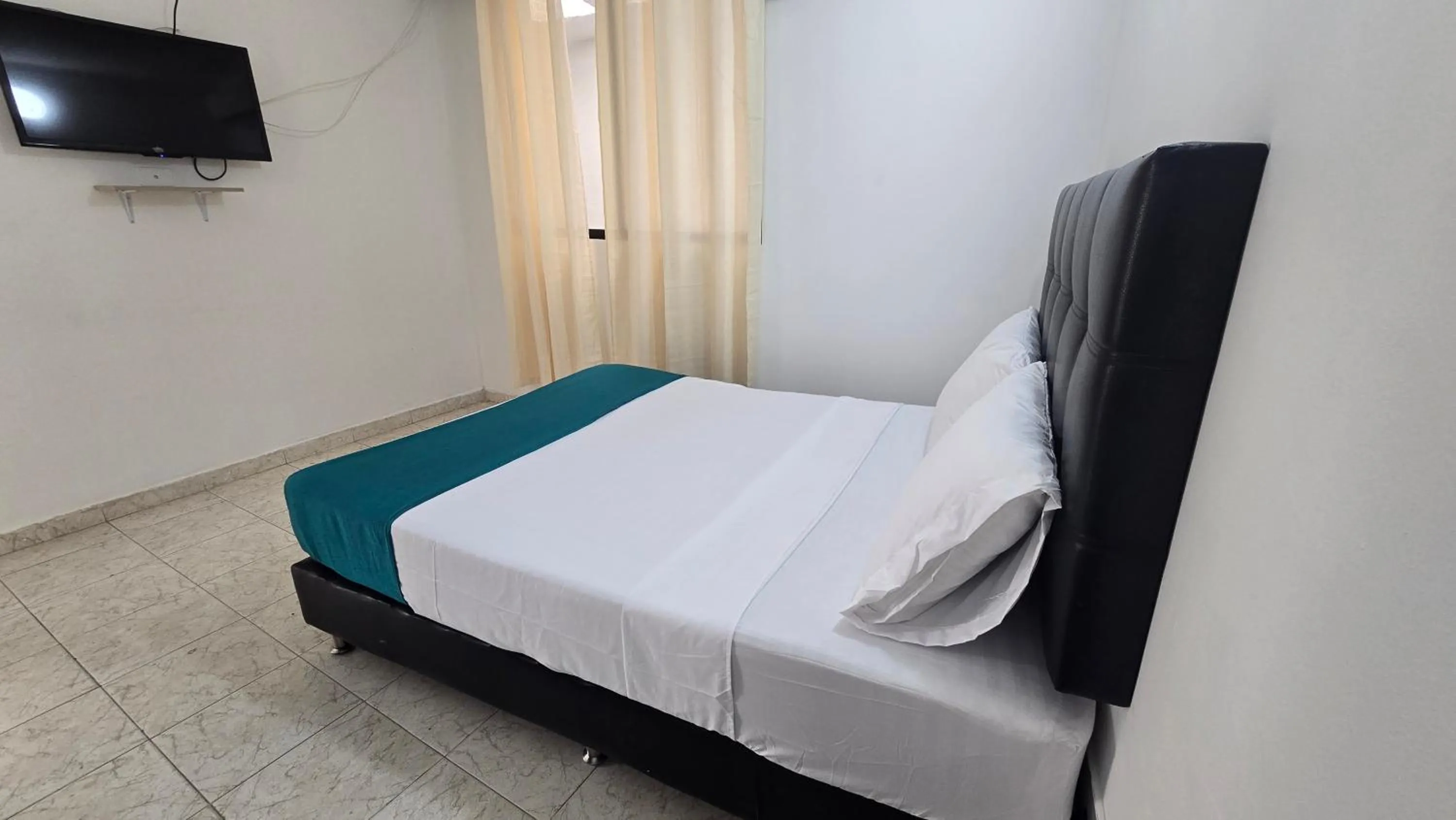 Photo of the whole room, Bed in Hotel Costa Caribe Barranquilla