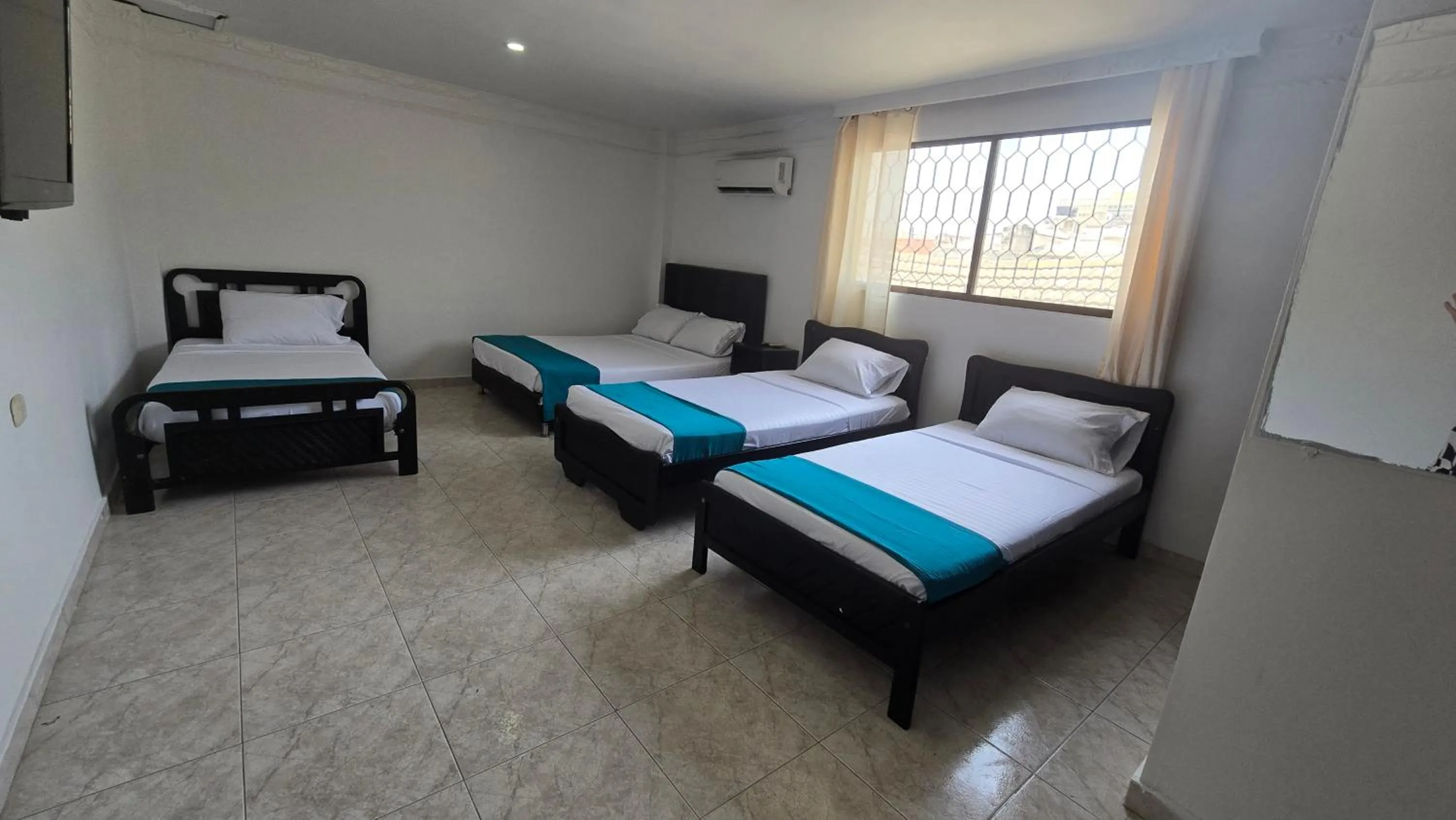 Photo of the whole room, Bed in Hotel Costa Caribe Barranquilla