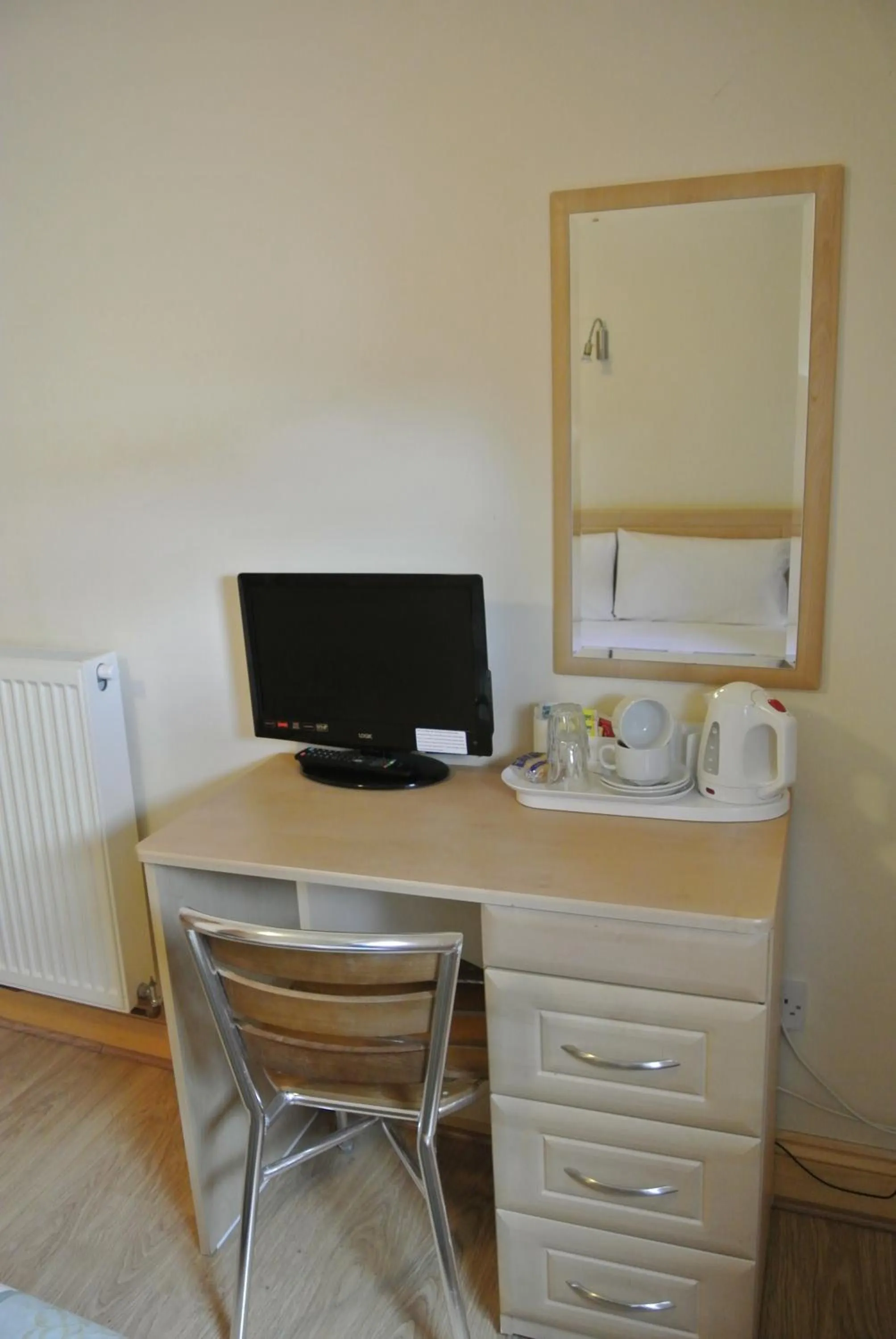 Bedroom in Carlton Hotel