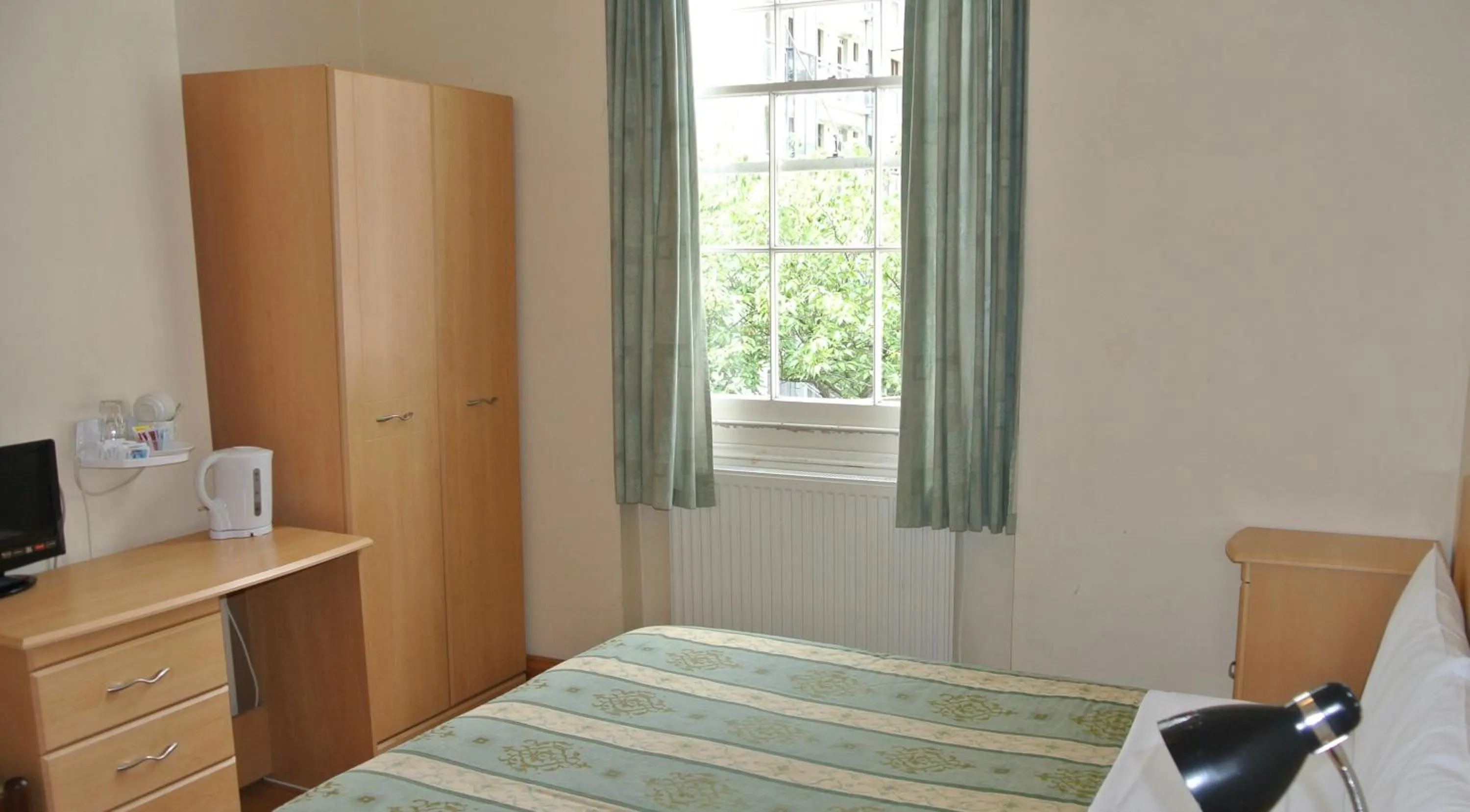 Photo of the whole room, Bed in European Hotel