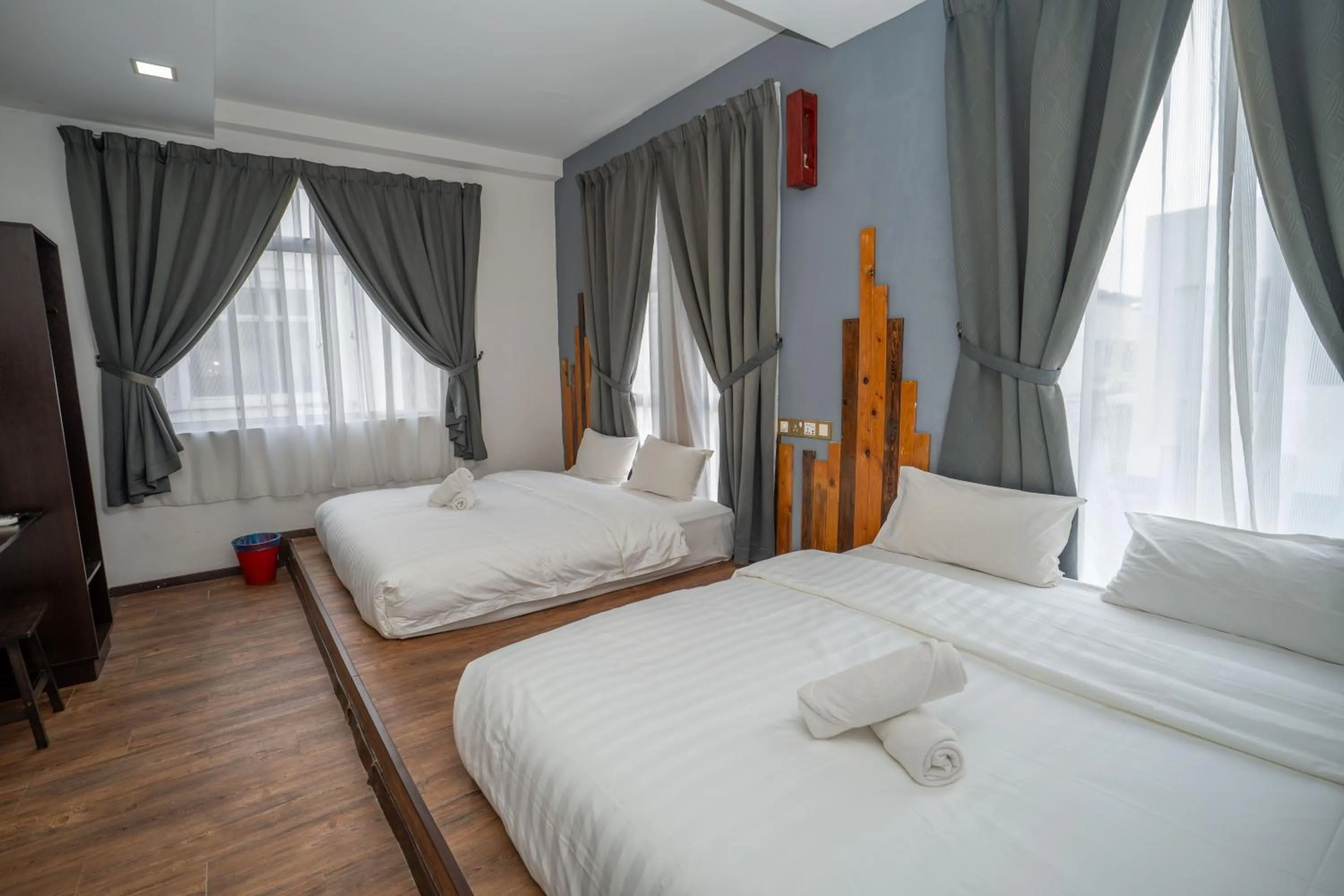 Bed in De Grand Boutique Hotel