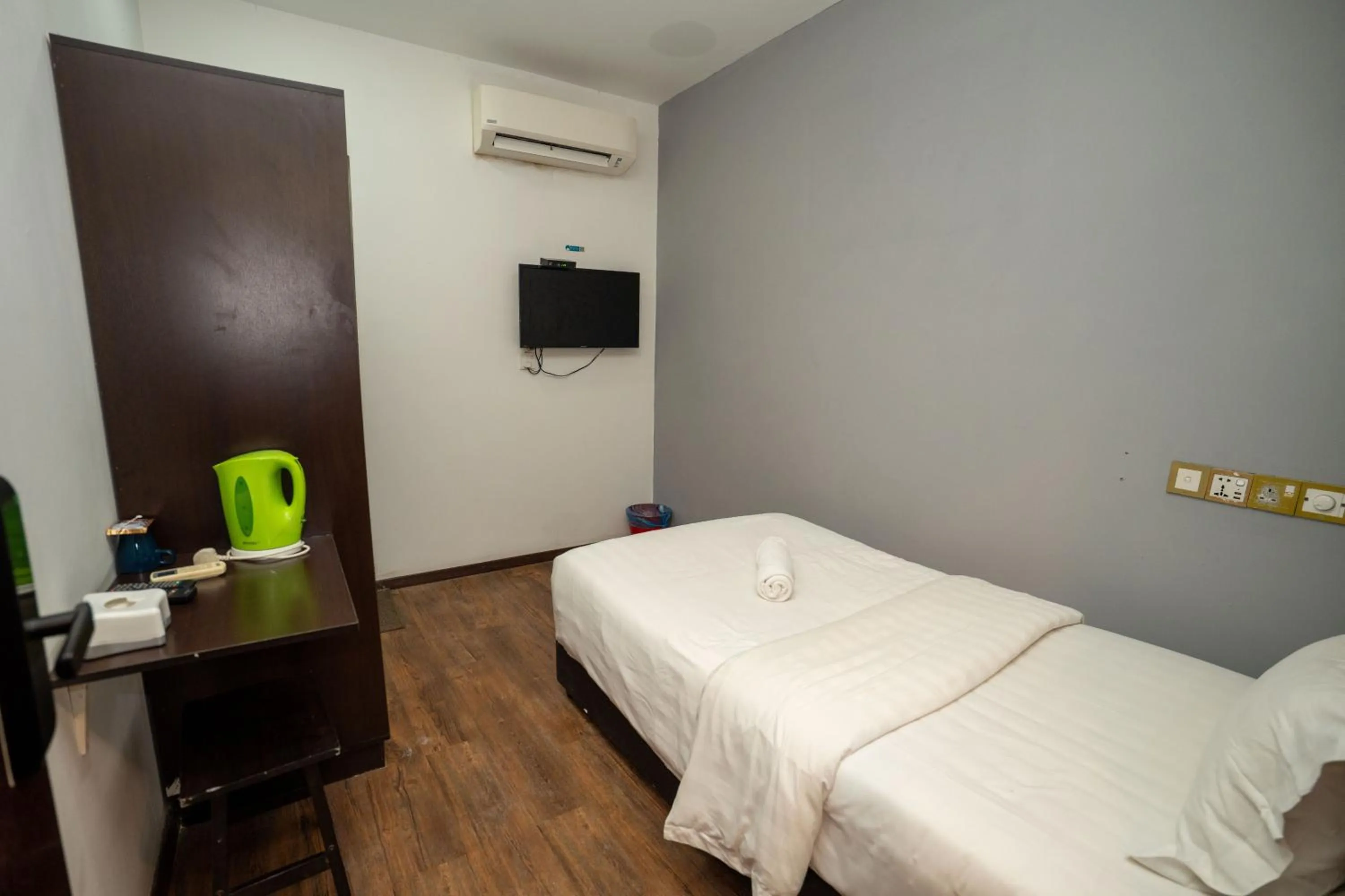 Bed in De Grand Boutique Hotel