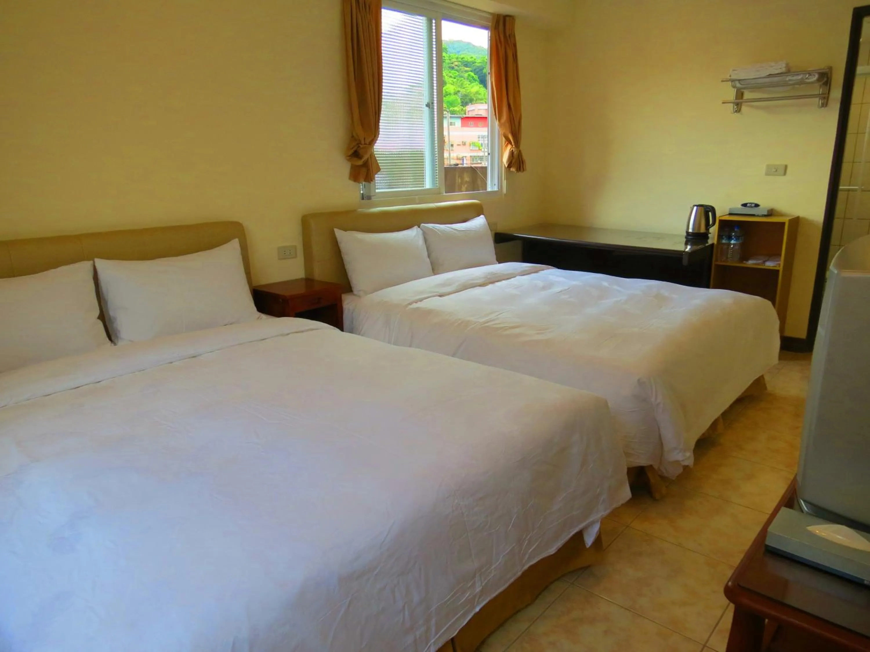 Decorative detail, Bed in eZ Stay Juifen(Ruifang Station)