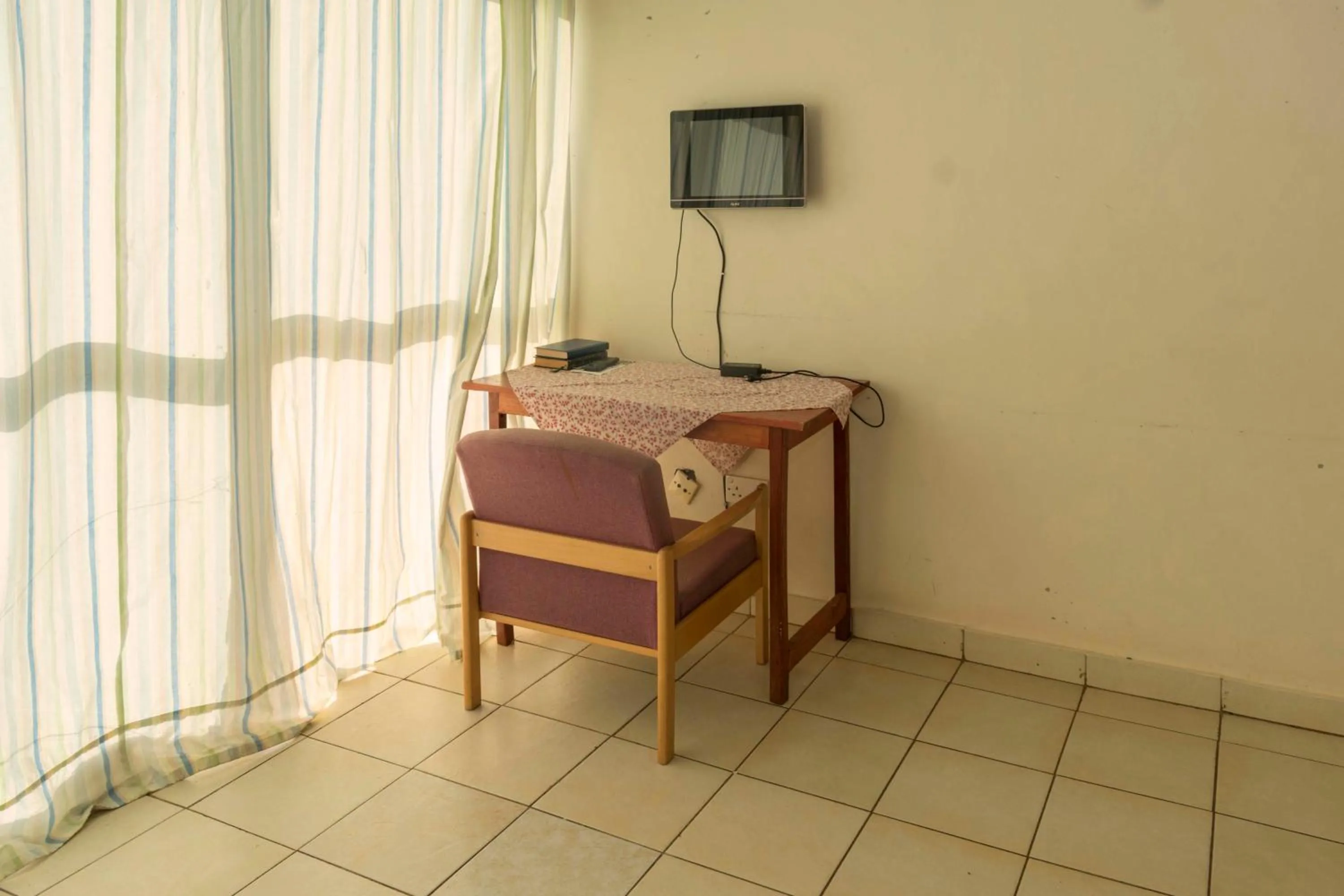 TV and multimedia in Sunrise Apartments Hotel Fort Portal