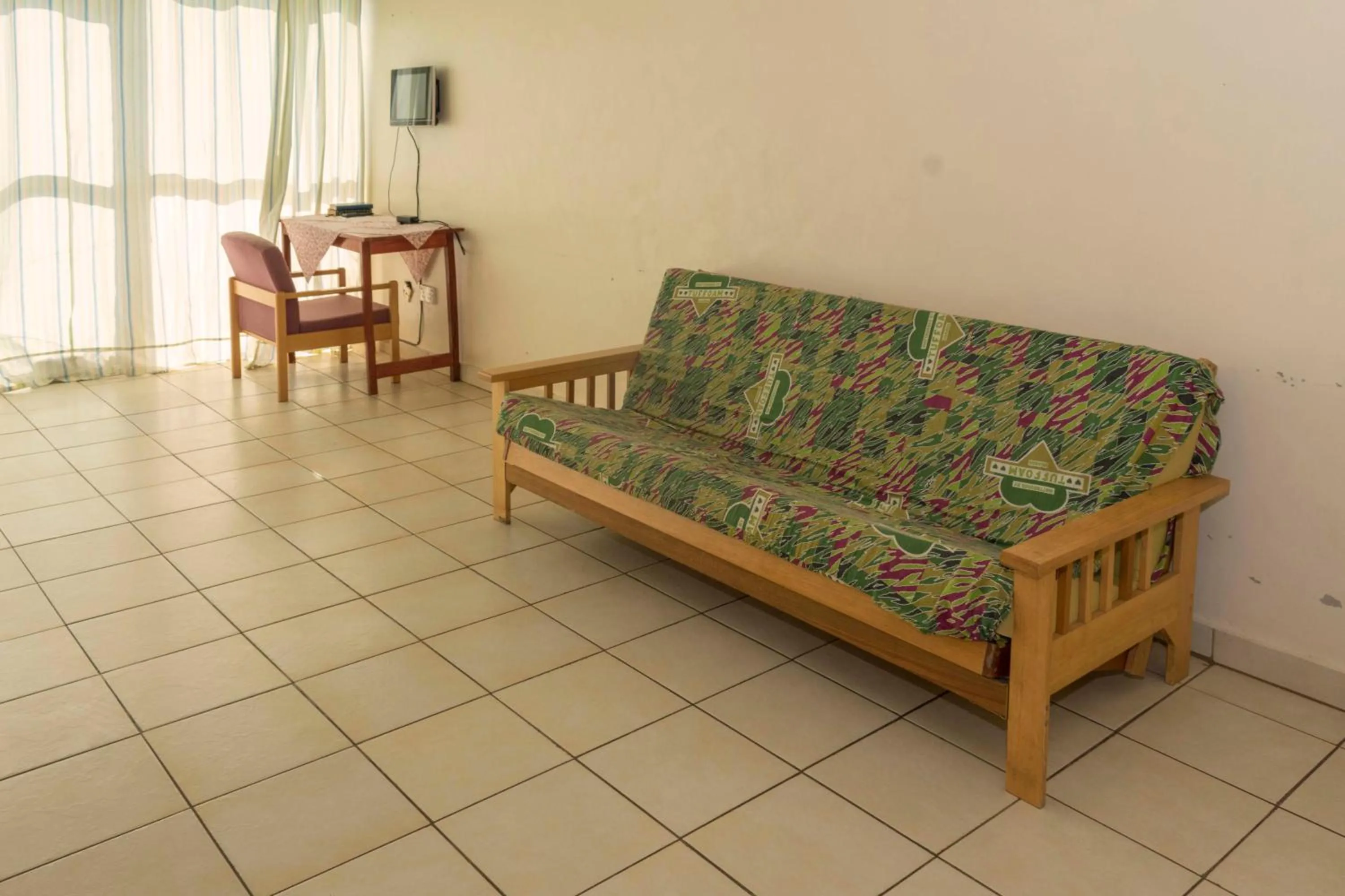 Living room in Sunrise Apartments Hotel Fort Portal