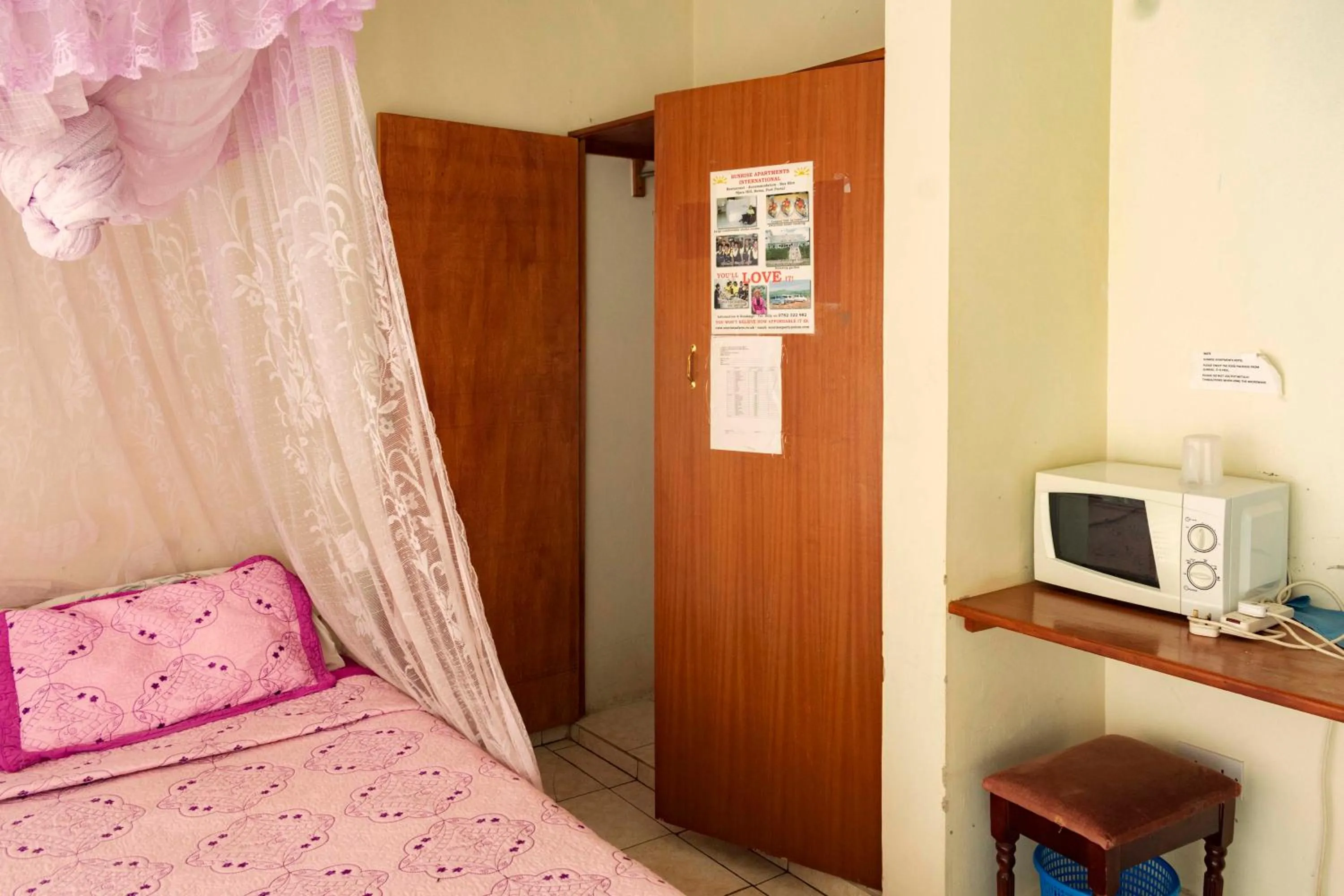 Bed in Sunrise Apartments Hotel Fort Portal