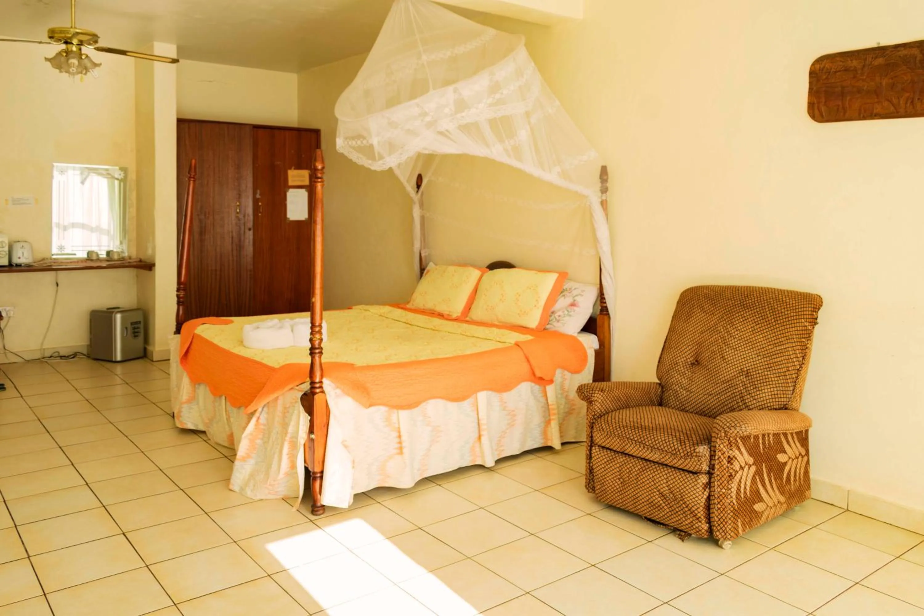 Photo of the whole room in Sunrise Apartments Hotel Fort Portal