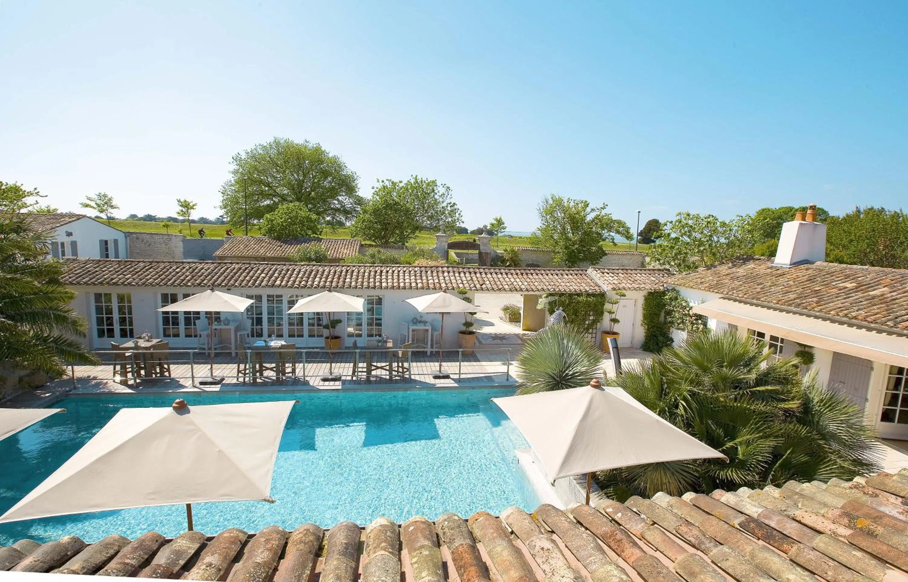 Pool view in Le Clos Saint-Martin Hôtel & Spa