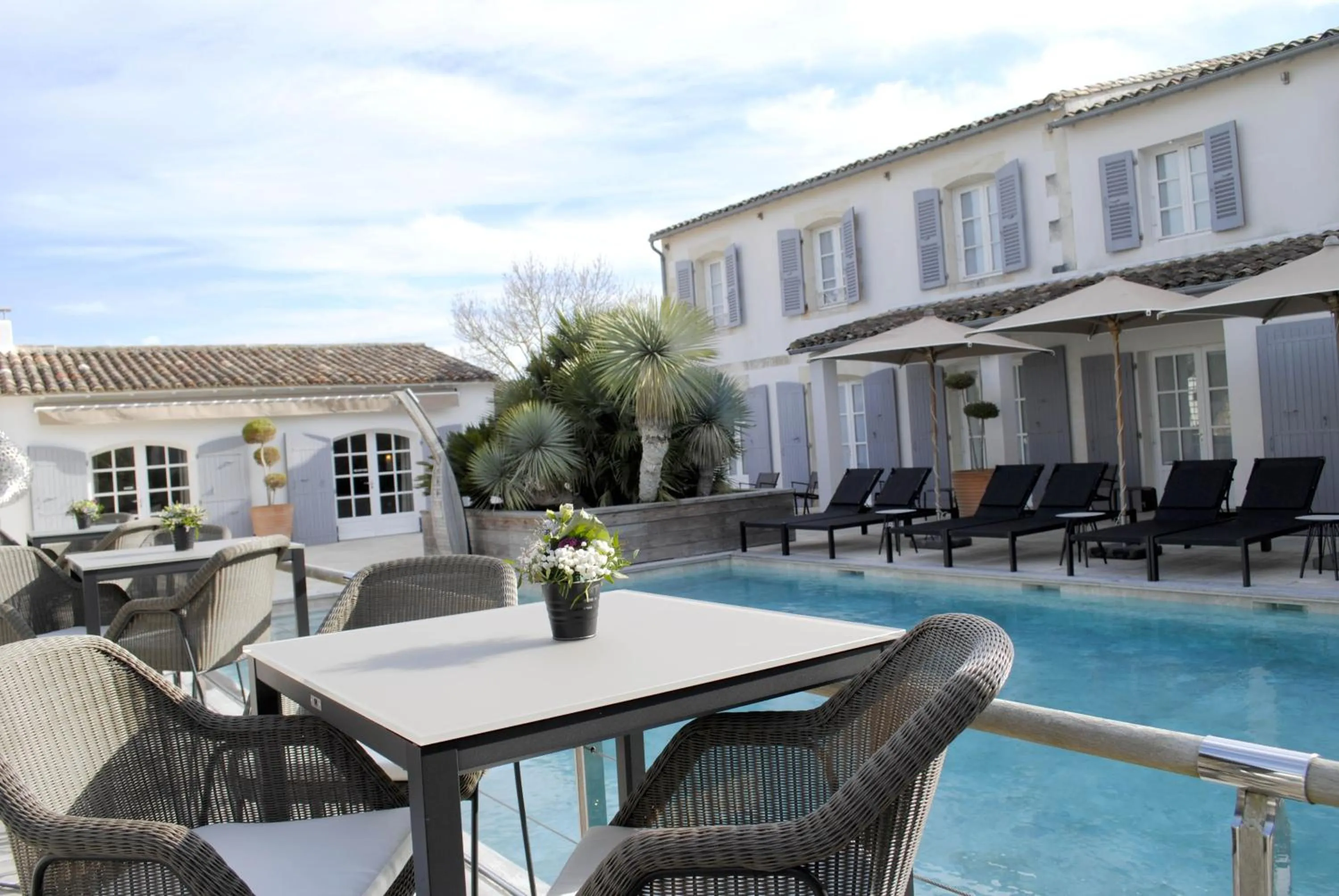 Swimming pool in Le Clos Saint-Martin Hôtel & Spa