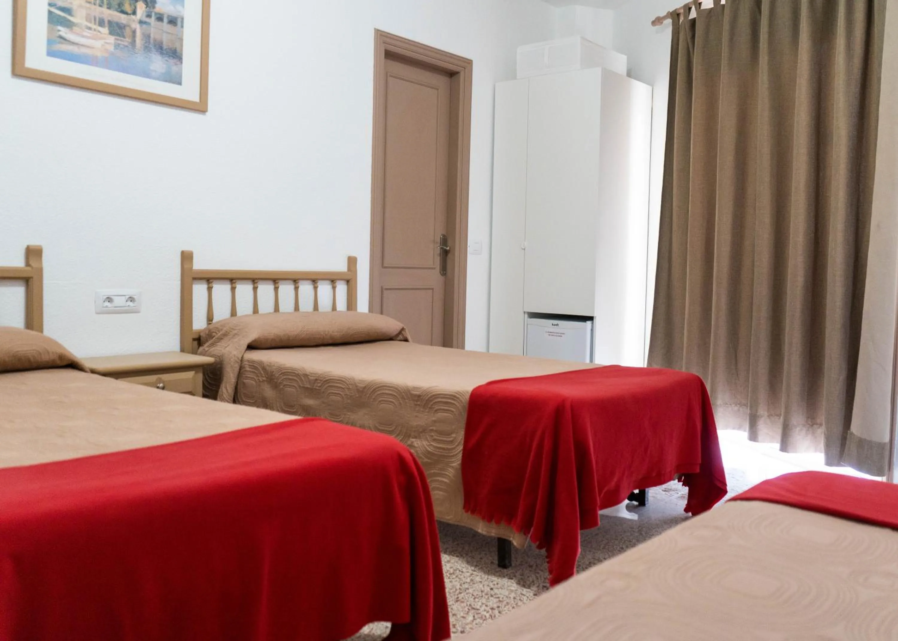 Bed in Pensión Alcalá