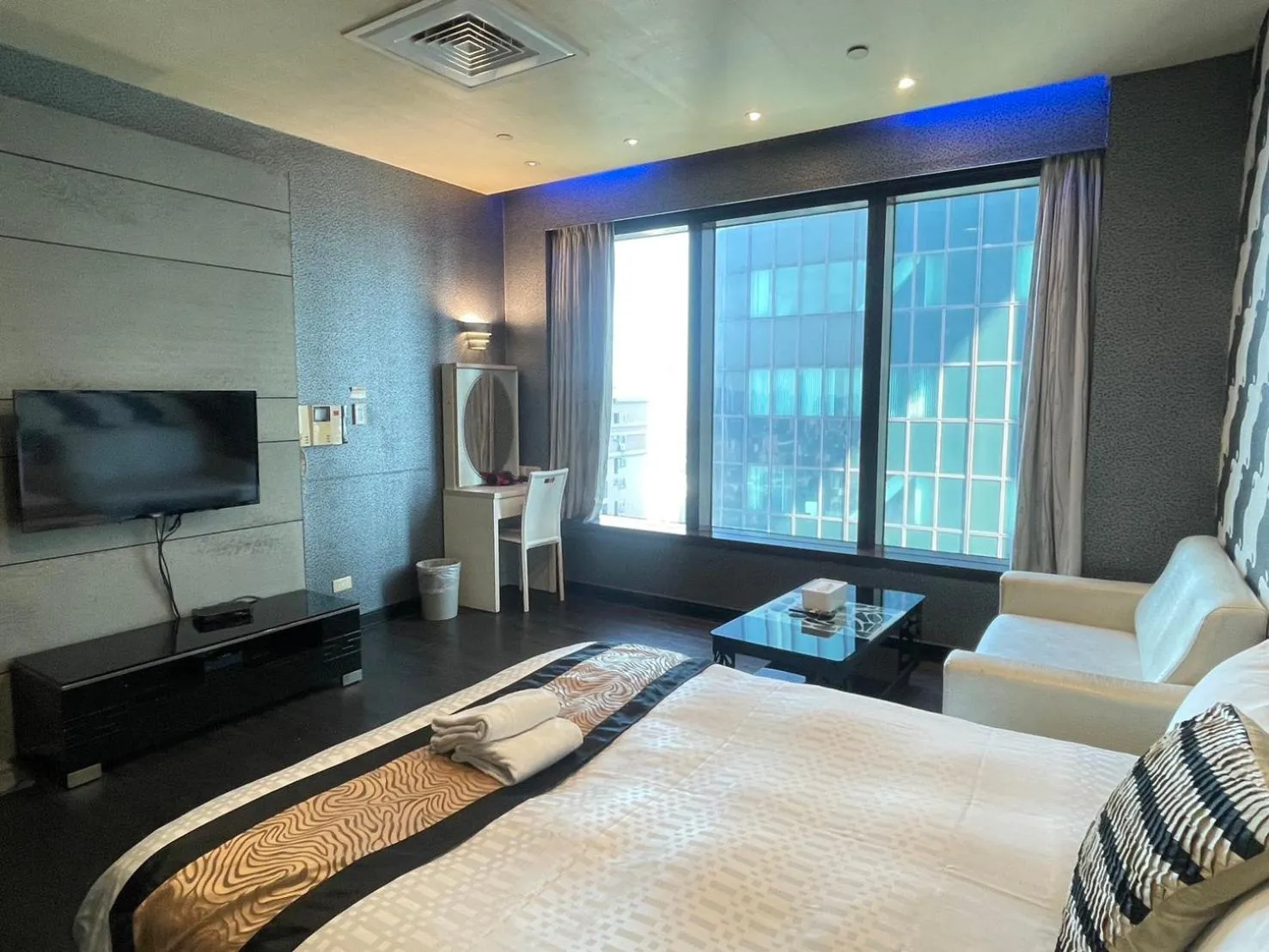Bed in Neo Sky Hotel