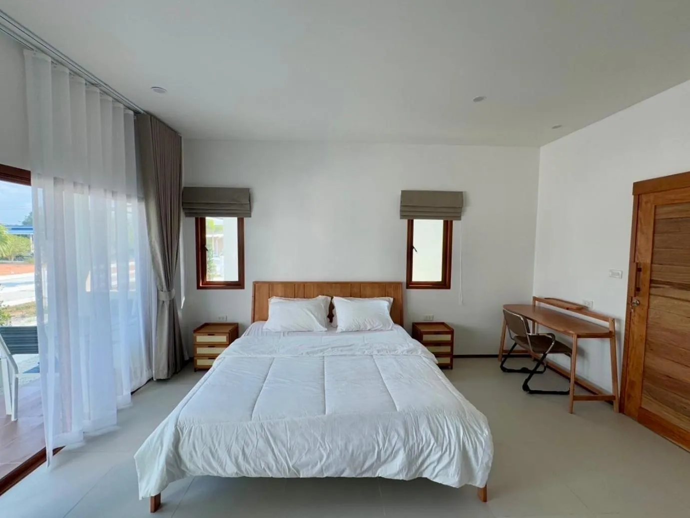 Bed in Maikhao Beach Guest House