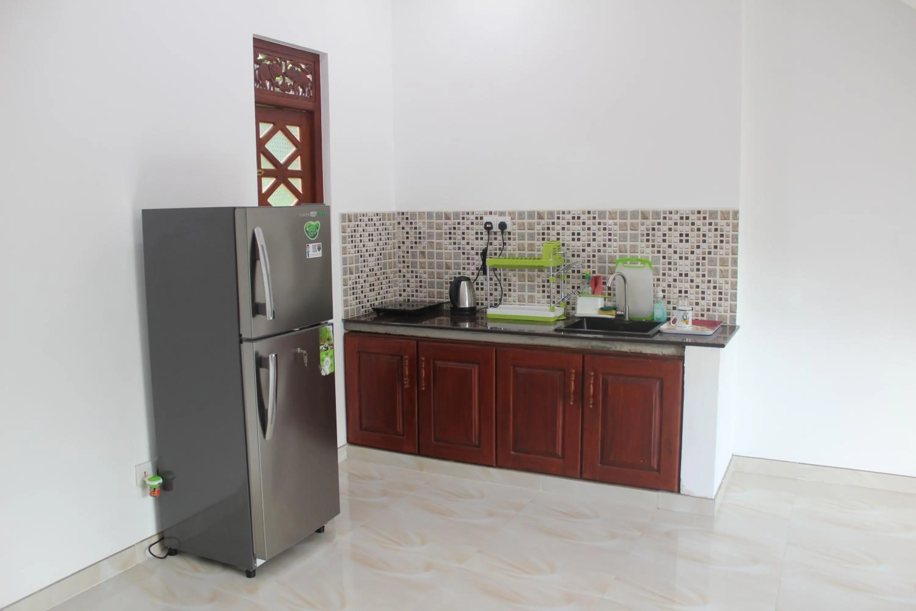 Kitchen or kitchenette in White Elephant Villa & Restaurant