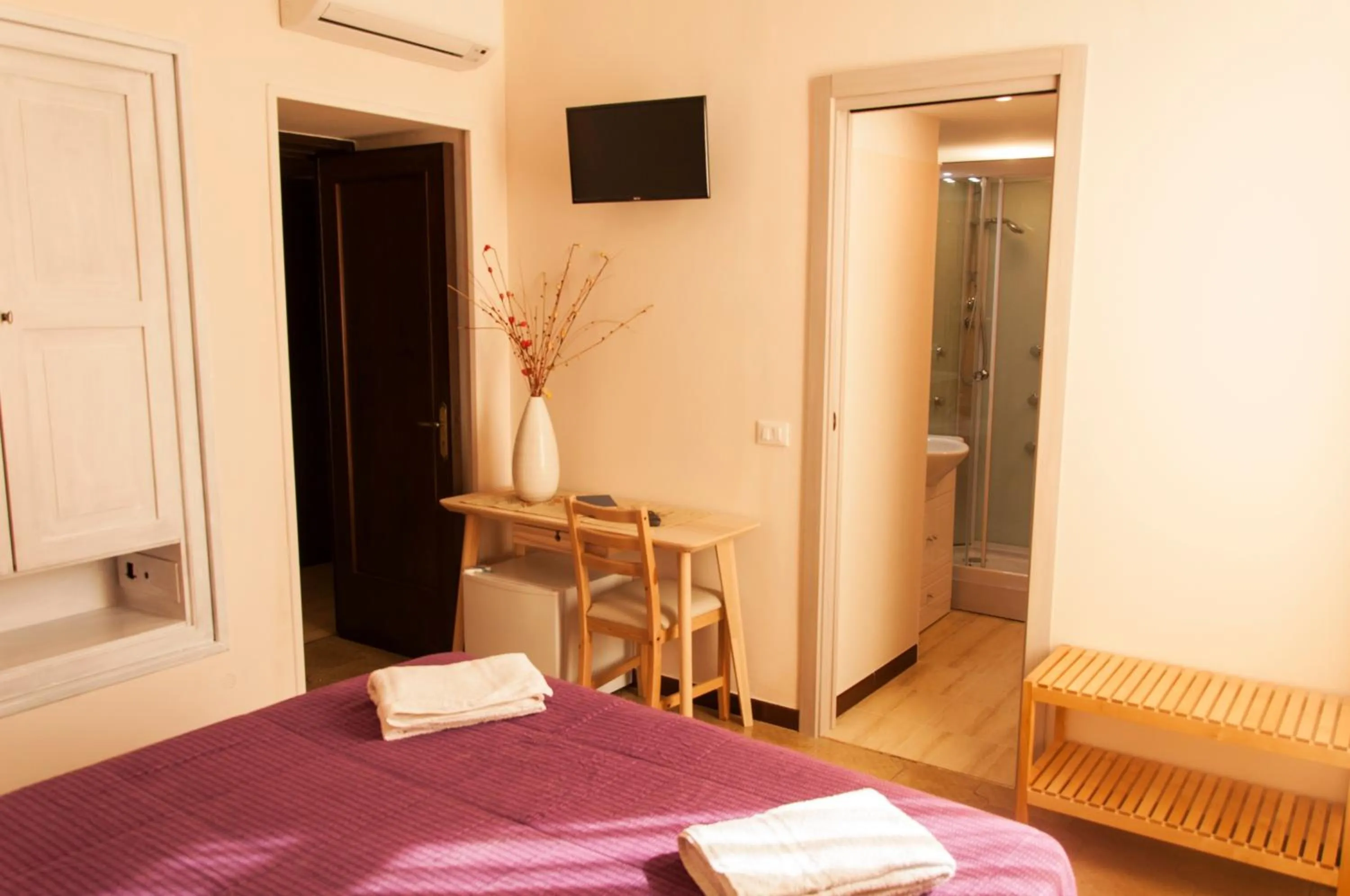 Bed in Palazzo Paladini Rooms Lecce