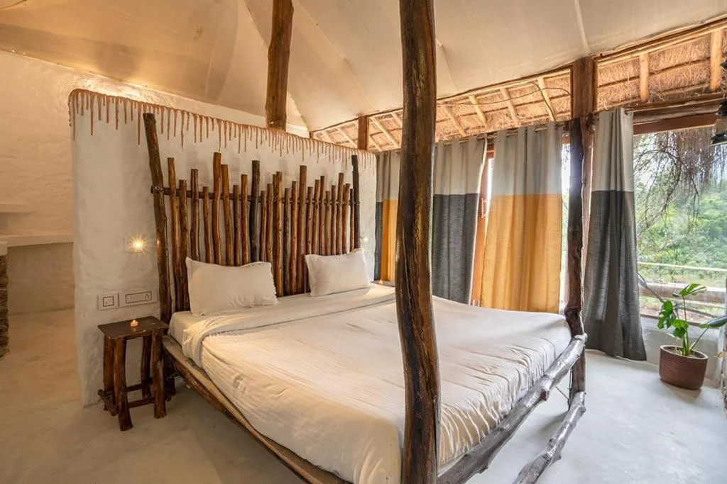 Bedroom, Bed in Deshadan Eco Valley Resort - An Eco friendly Mud House