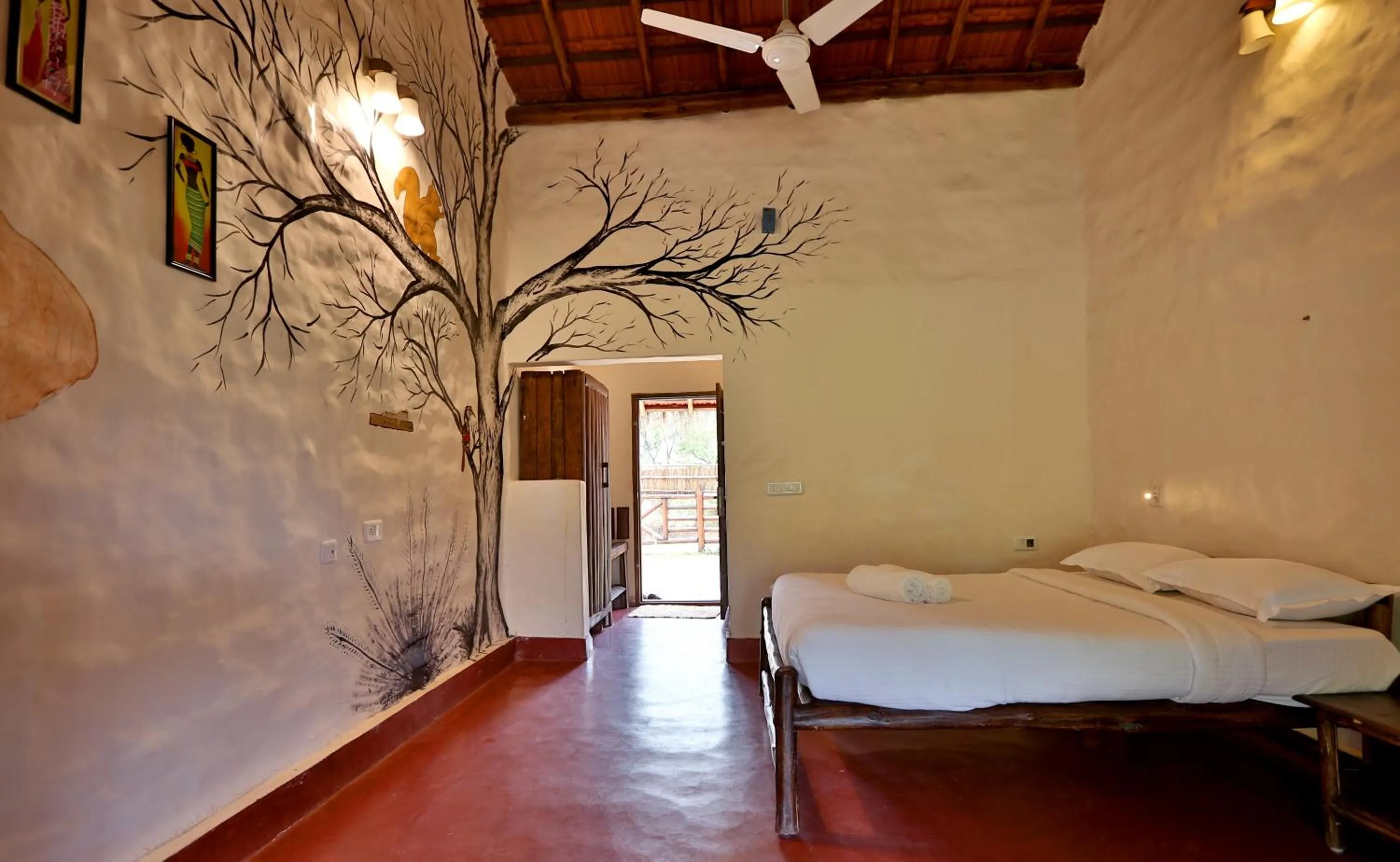 Bed in Deshadan Eco Valley Resort - An Eco friendly Mud House
