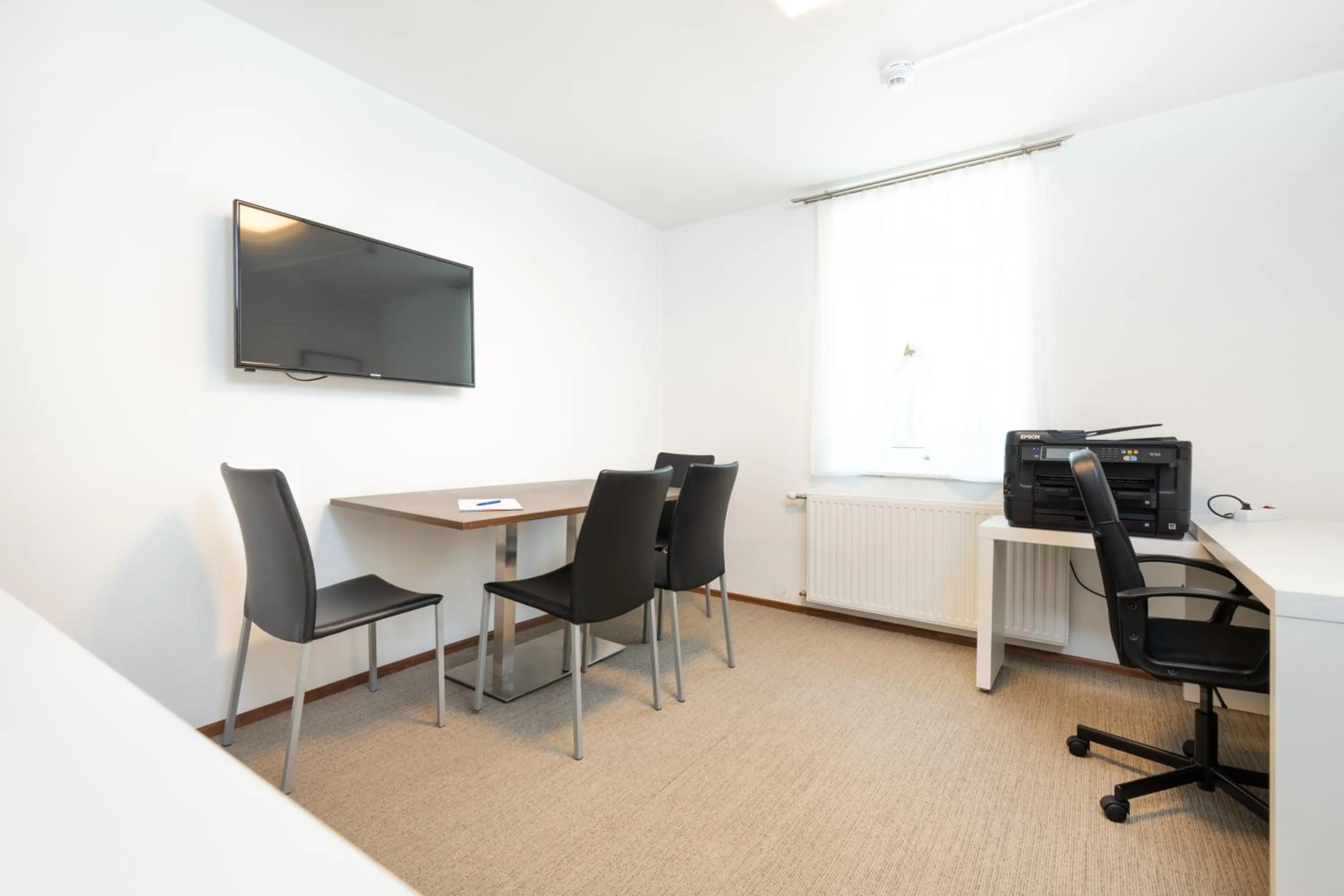 Communal lounge/ TV room in Velden24 - create your own stay