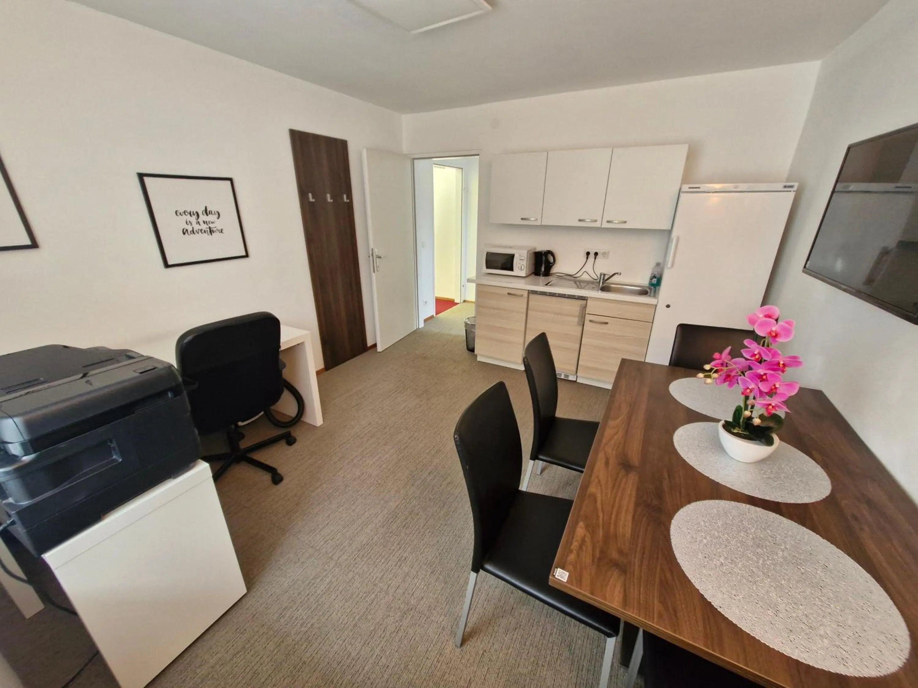 Communal lounge/ TV room in Velden24 - create your own stay