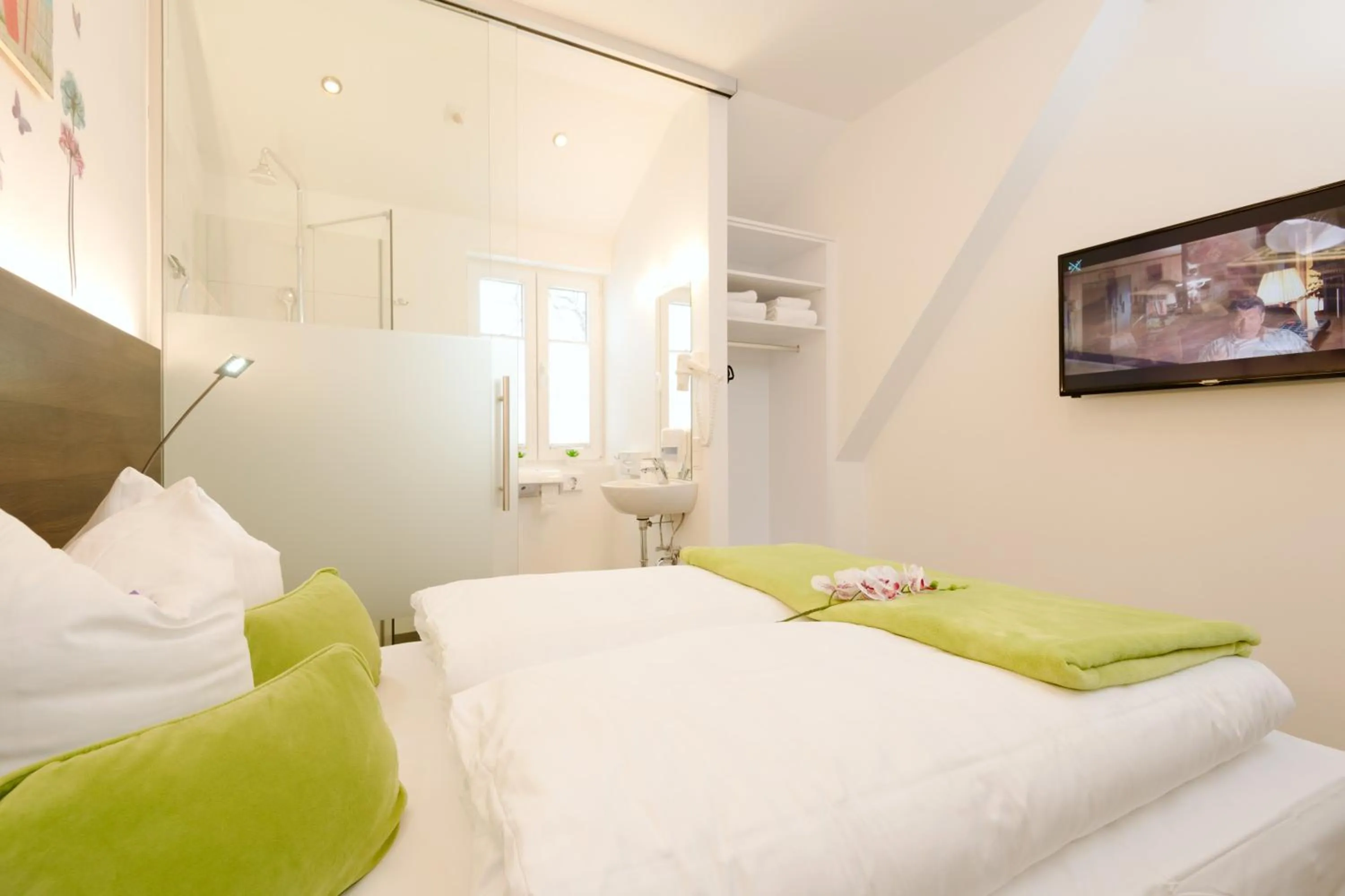 Bathroom, Bed in Velden24 - create your own stay
