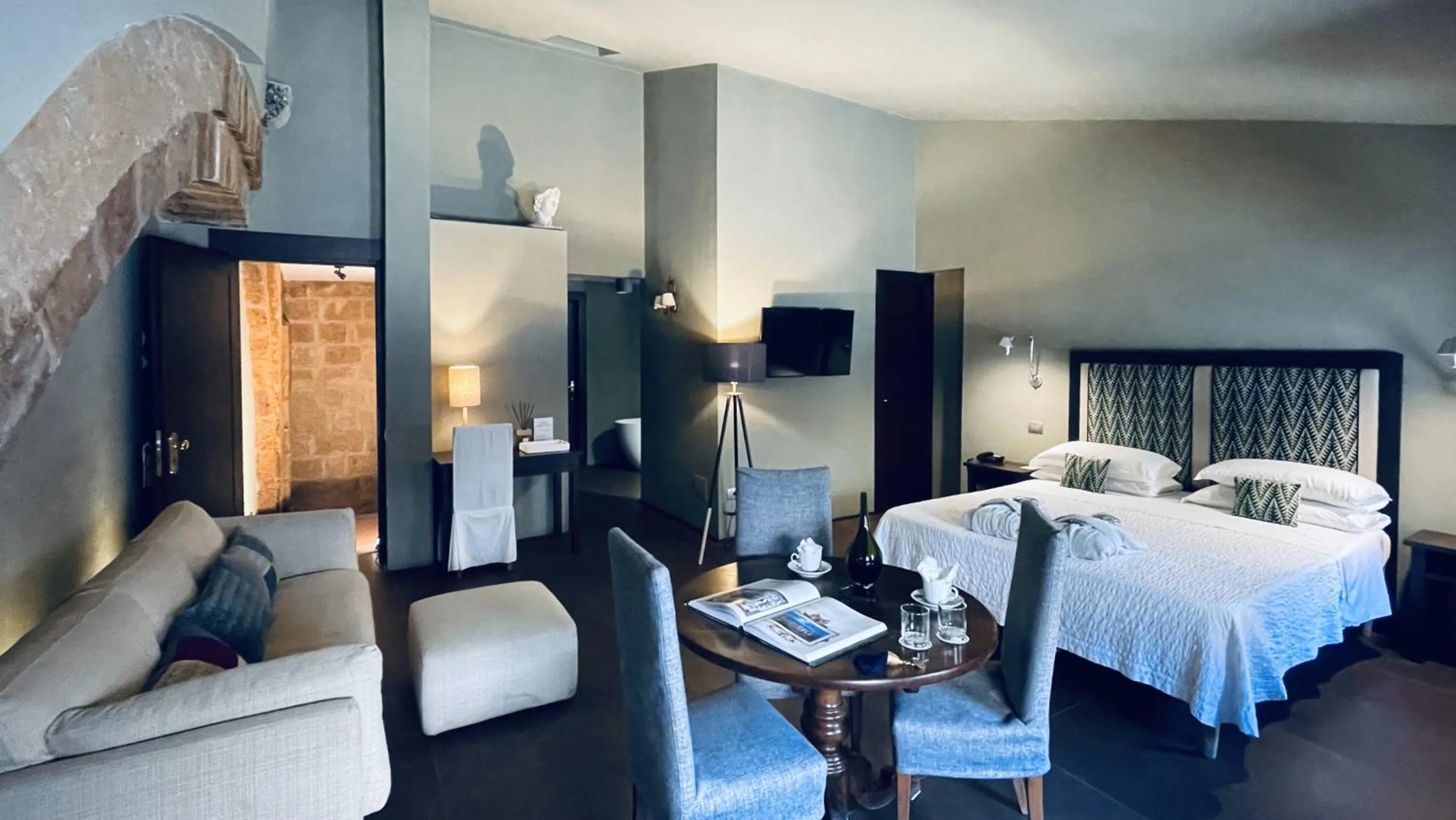 Bed in Hotel Palazzo Piccolomini