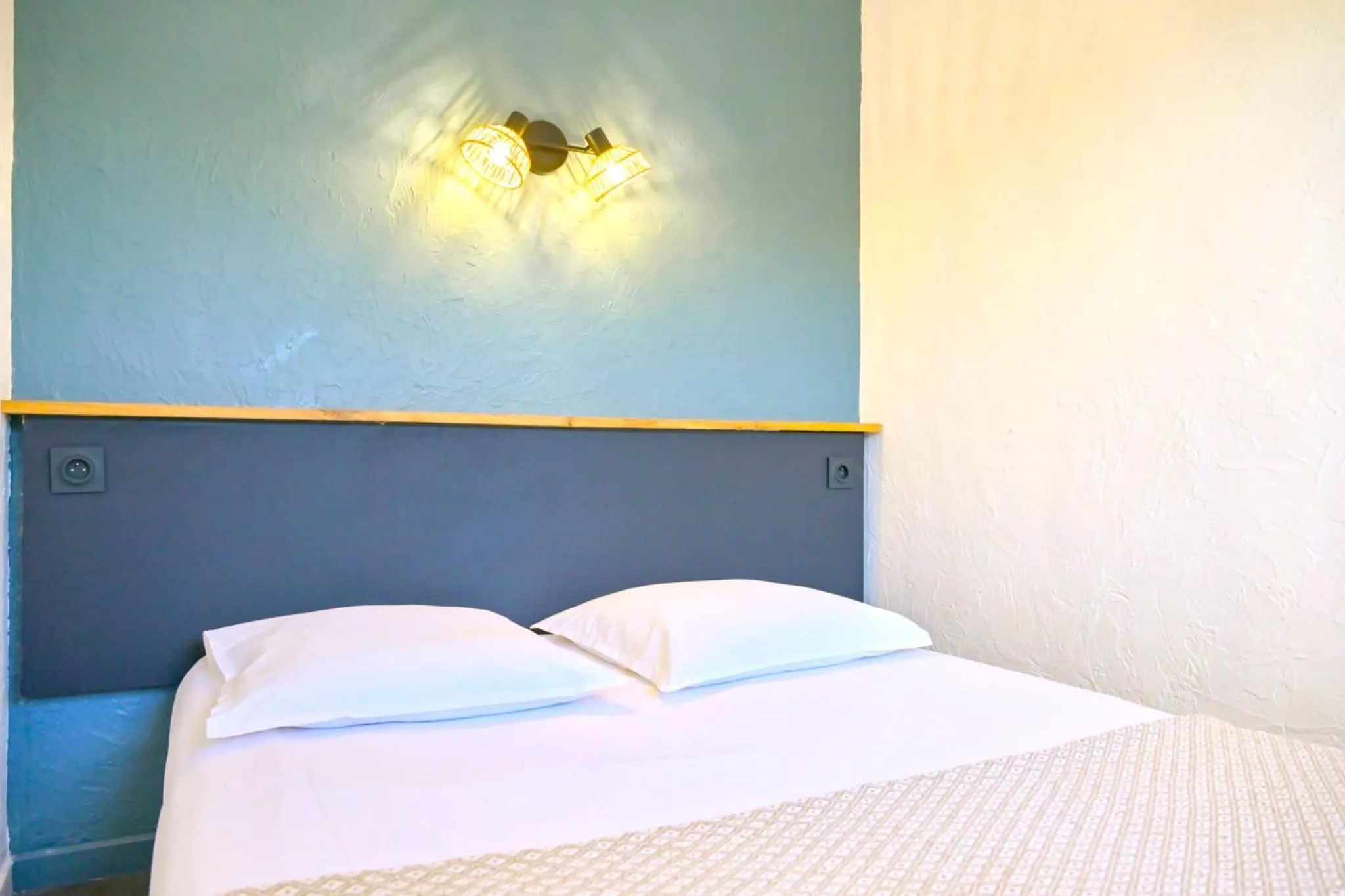 Bed in MOTEL ASCOT - Hotel & Appartements