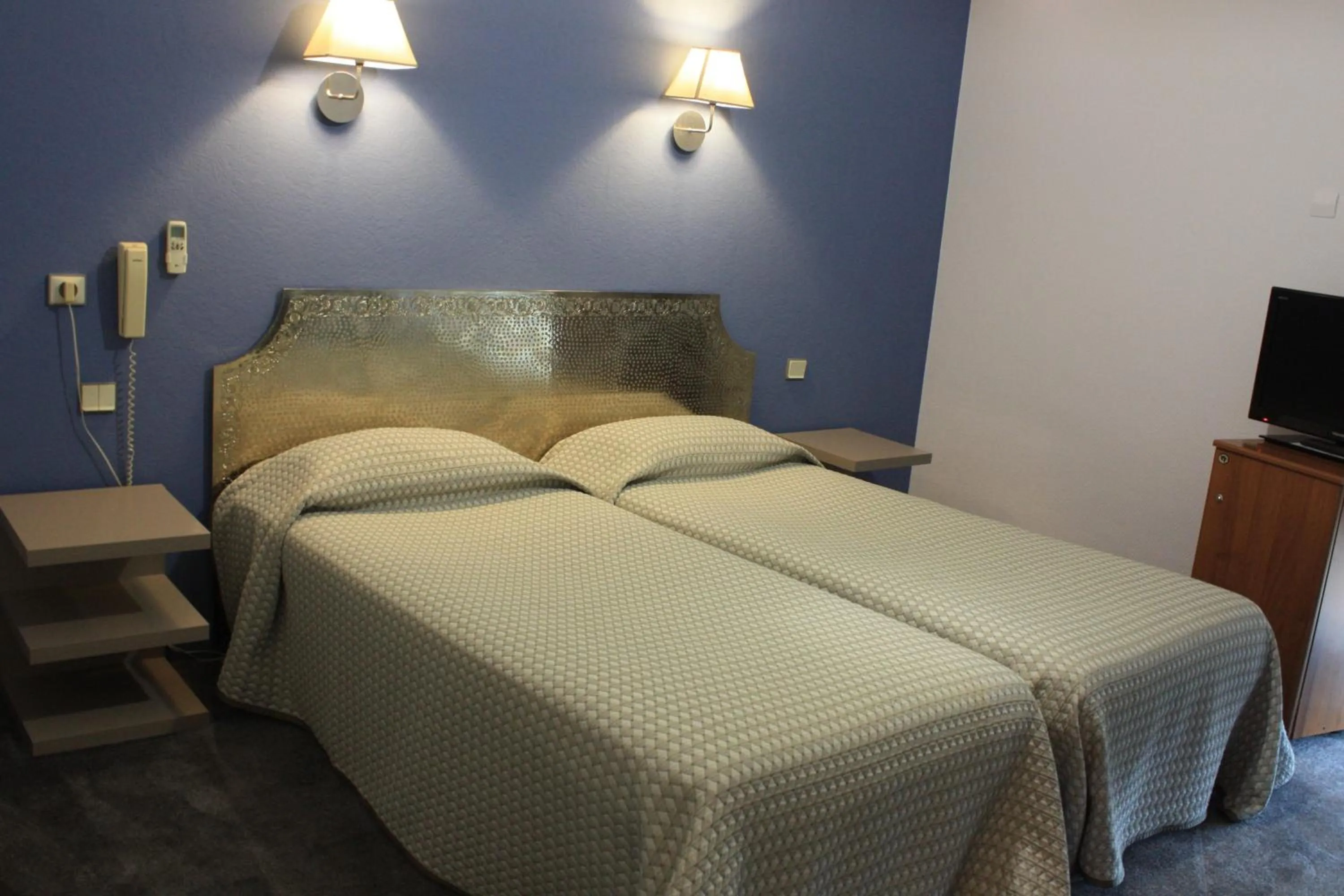 Bed in Hôtel restaurant LOGIS HOTELLERIE DE BALAJAN