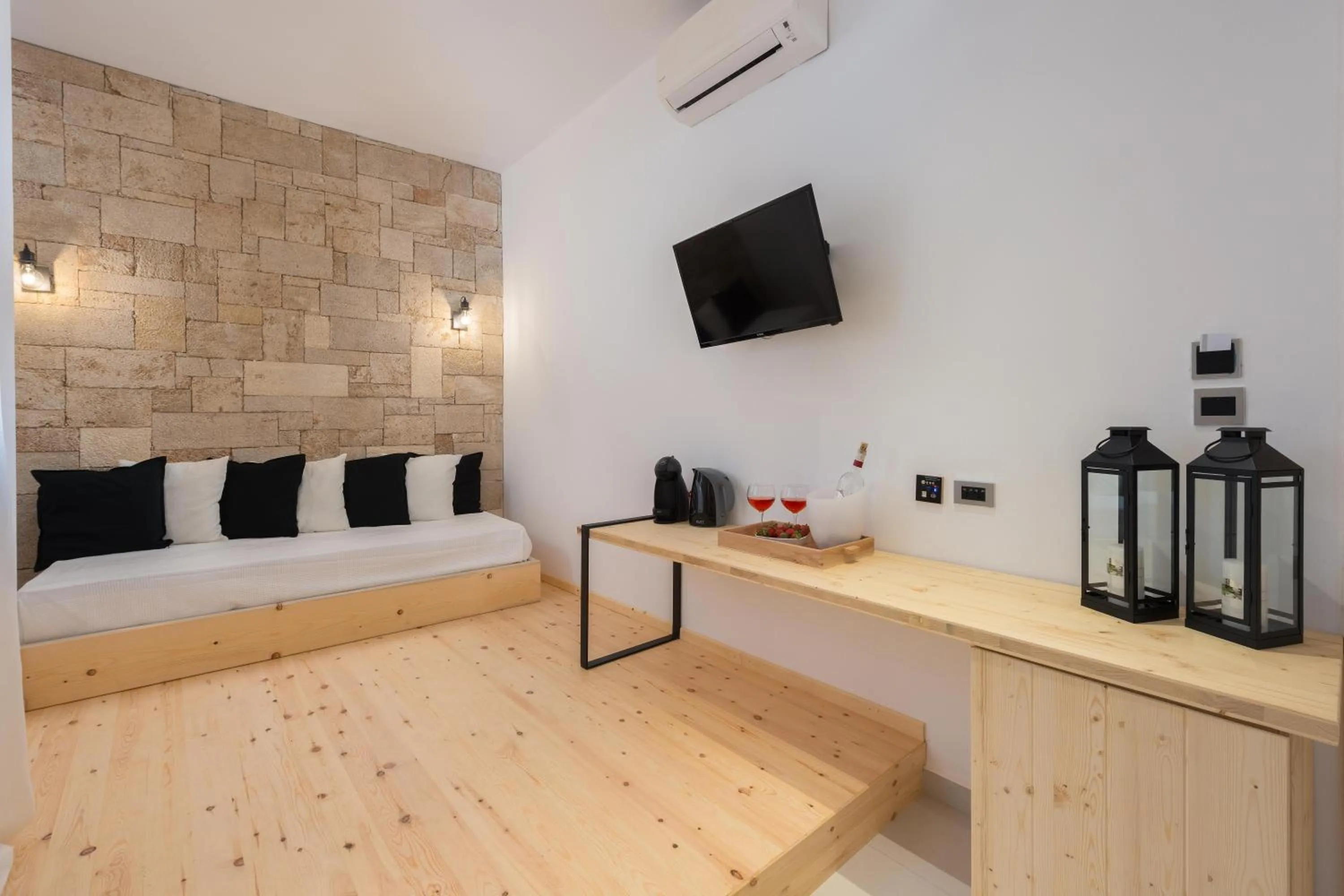 Seating area, Bed in Old Town Senses Boutique Hotel