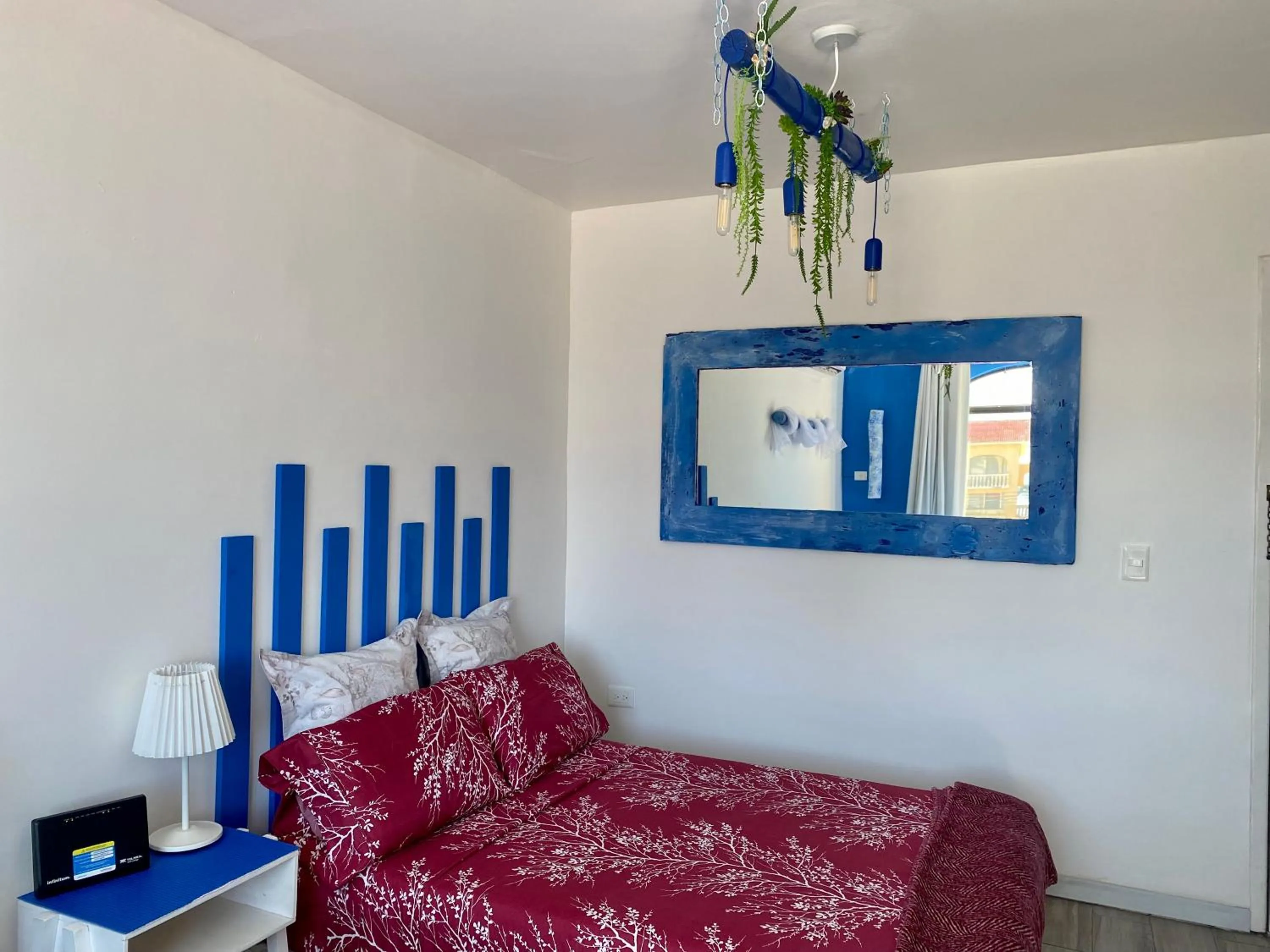 Bed in Tropical apartment