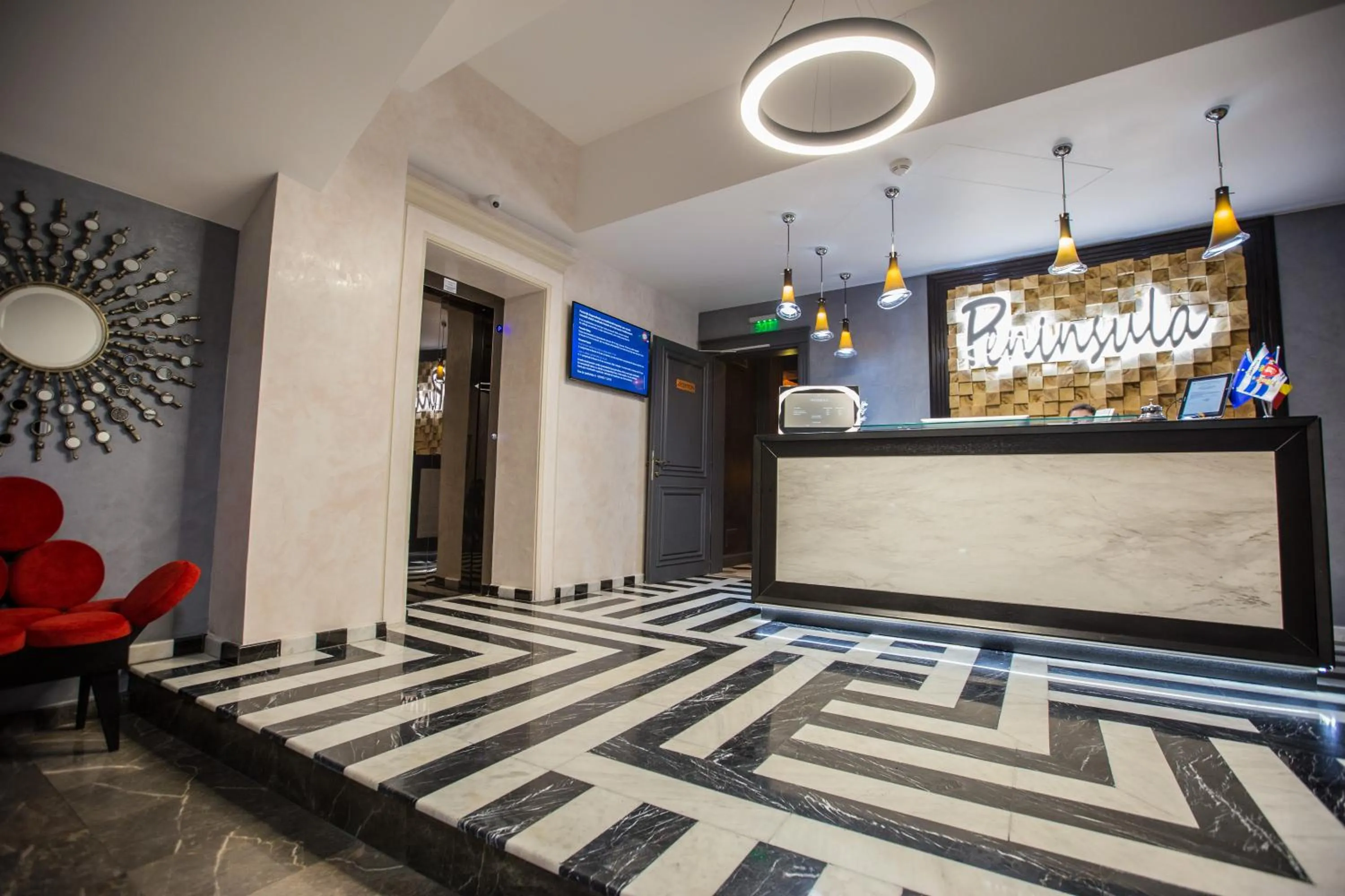 Lobby or reception in Peninsula Boutique Hotel