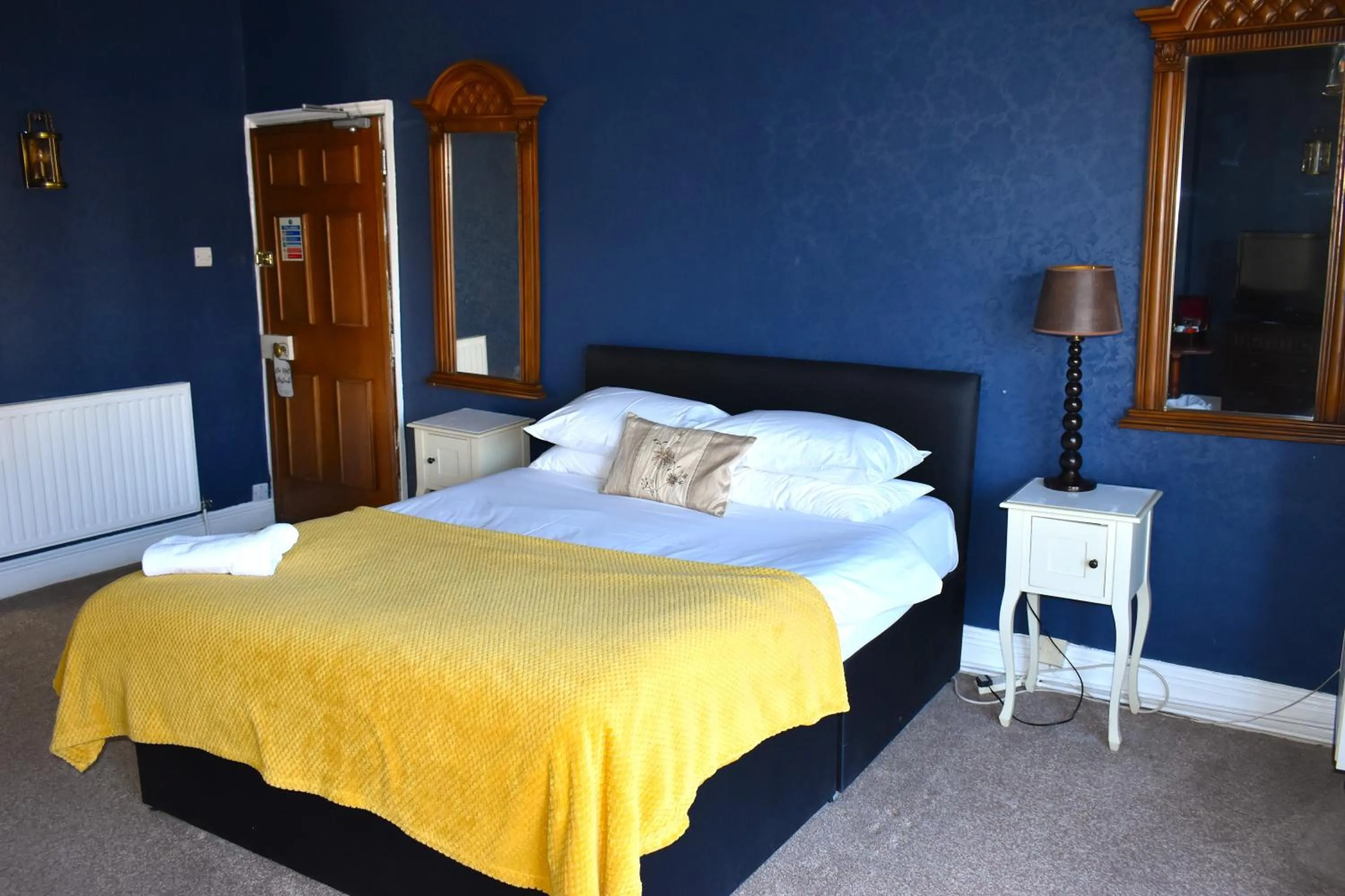 Bed in Donington Manor Hotel