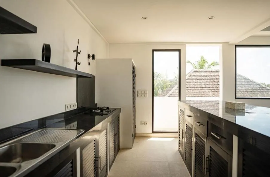 Kitchen or kitchenette in Echo Beach Duo