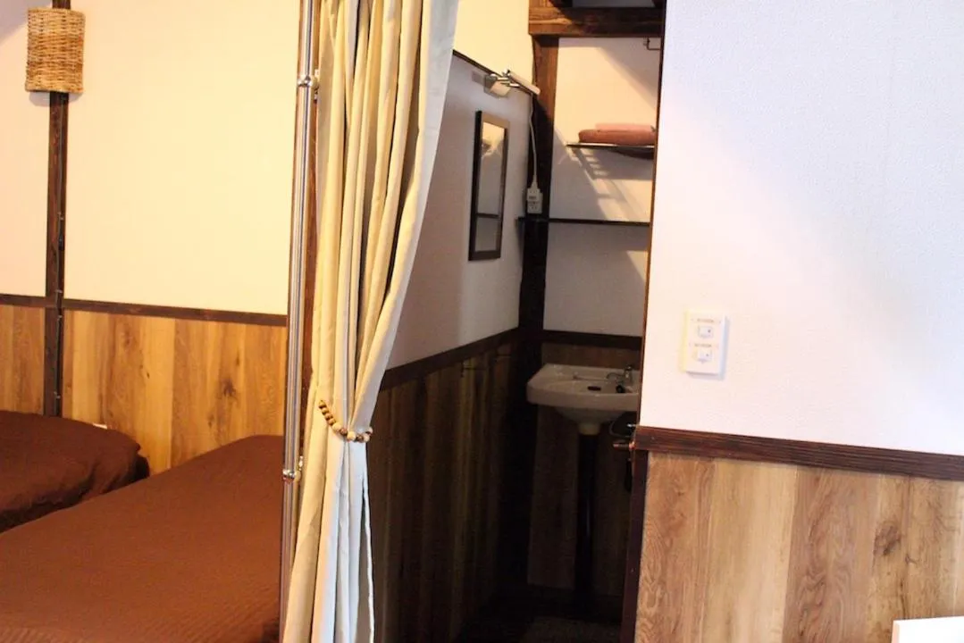 Bed in Nangoku Lodge Booya